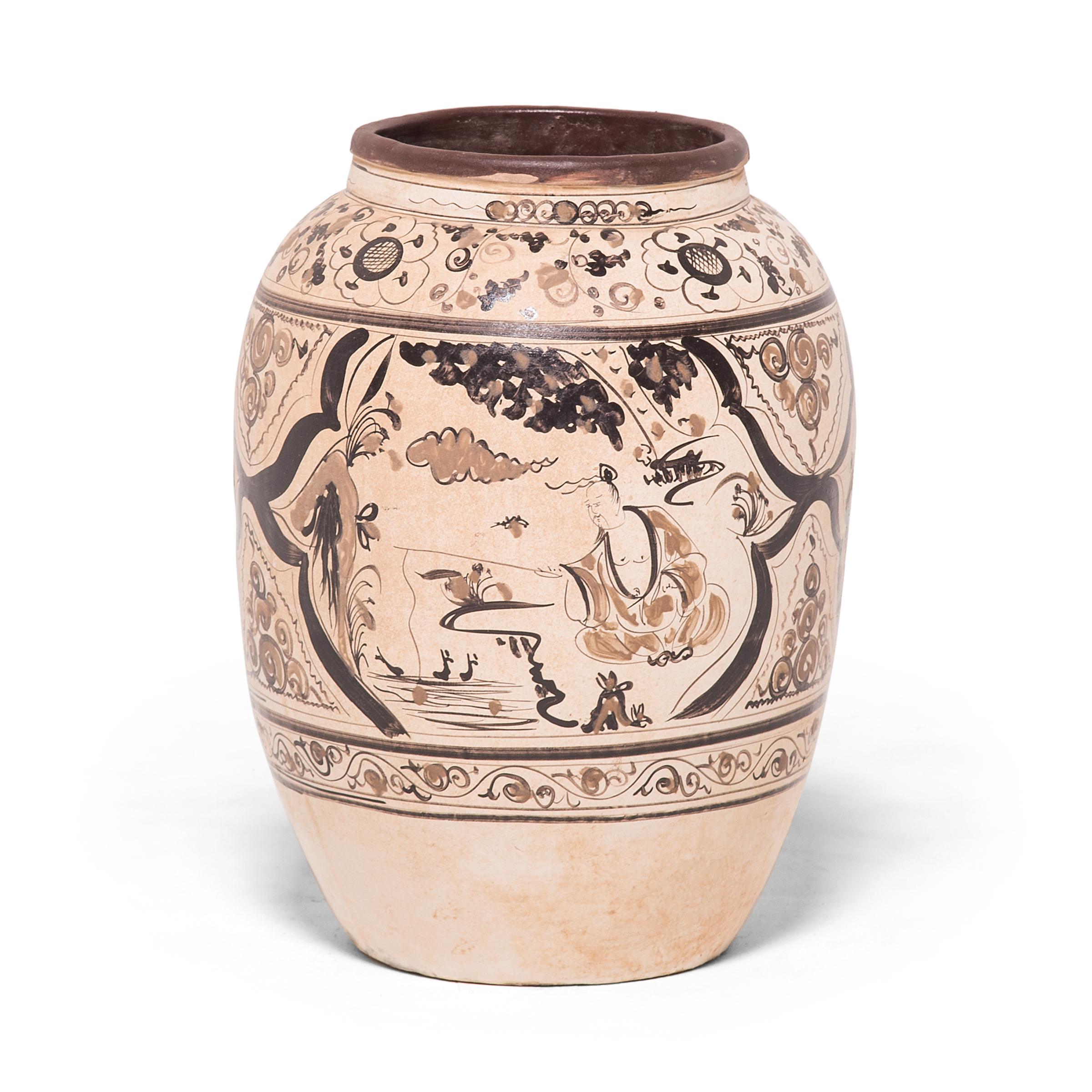Painted in the style of Ming-dynasty cizhou ware, this early 20th century wine jar is hand painted with gestural brushstrokes of warm browns atop a creamy-white slip base. Horizontal bands of trailing vines and floral motifs frame scenes of a