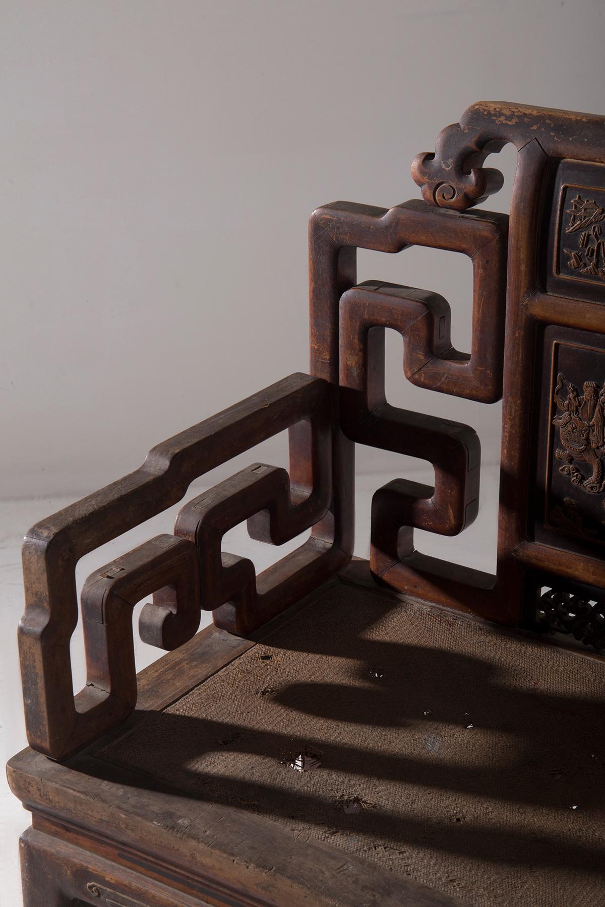 This low Qing-style chair, probably identifiable as a 