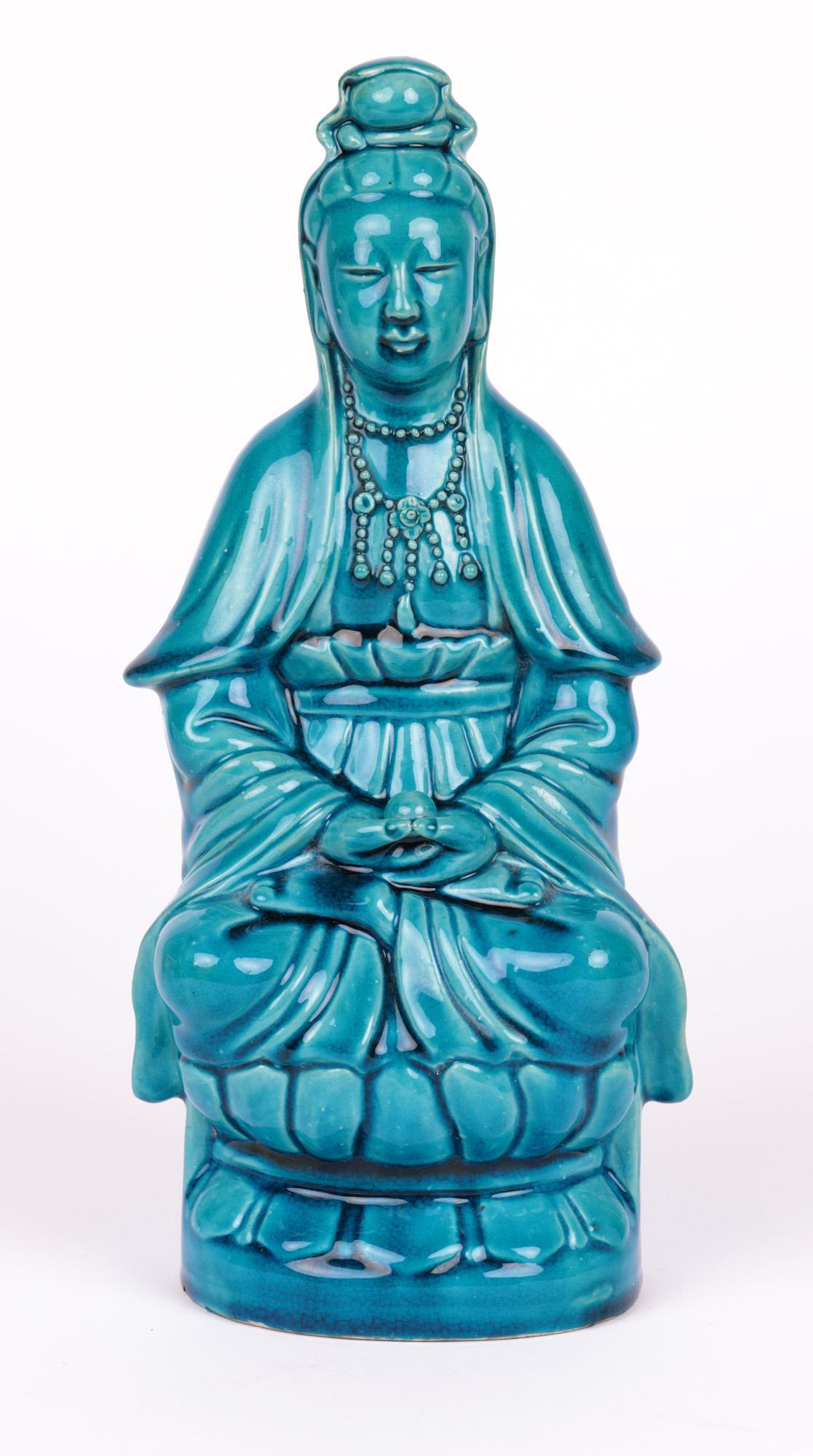 Chinese Qing Turquoise Glazed Porcelain Seated Guanyin Figure For Sale 1