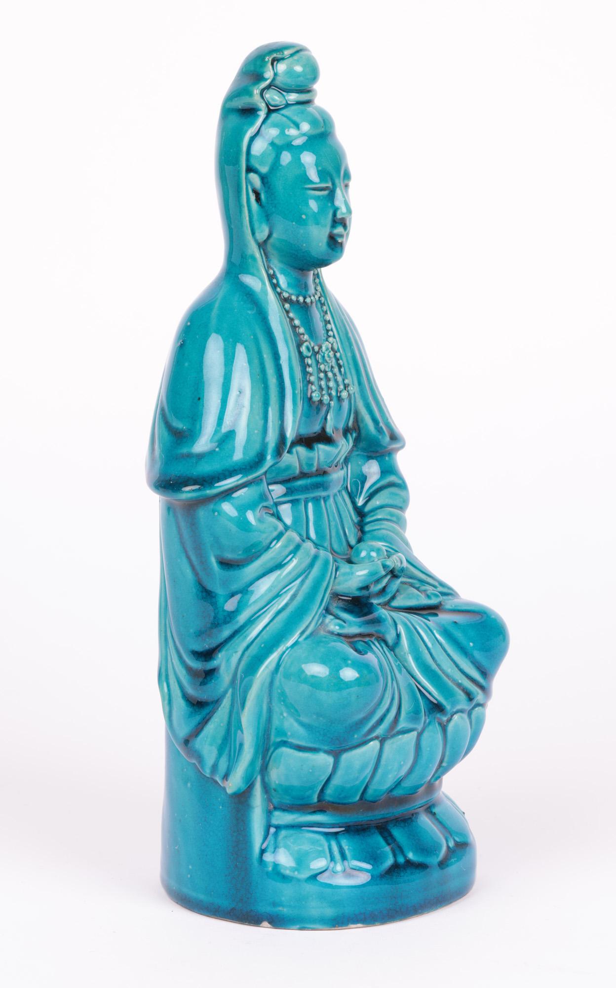 Chinese Qing Turquoise Glazed Porcelain Seated Guanyin Figure For Sale 3