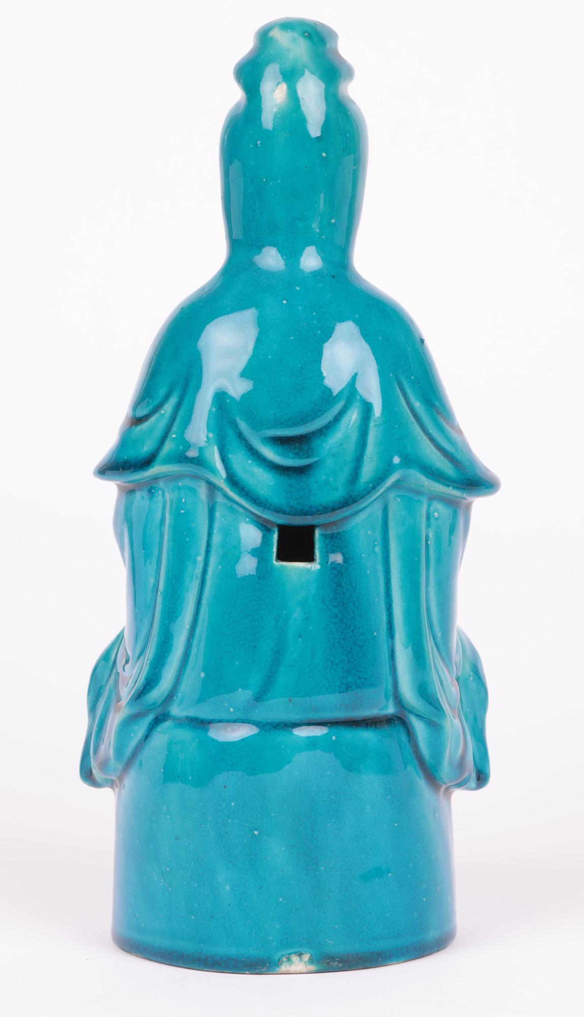 Chinese Qing Turquoise Glazed Porcelain Seated Guanyin Figure For Sale 4