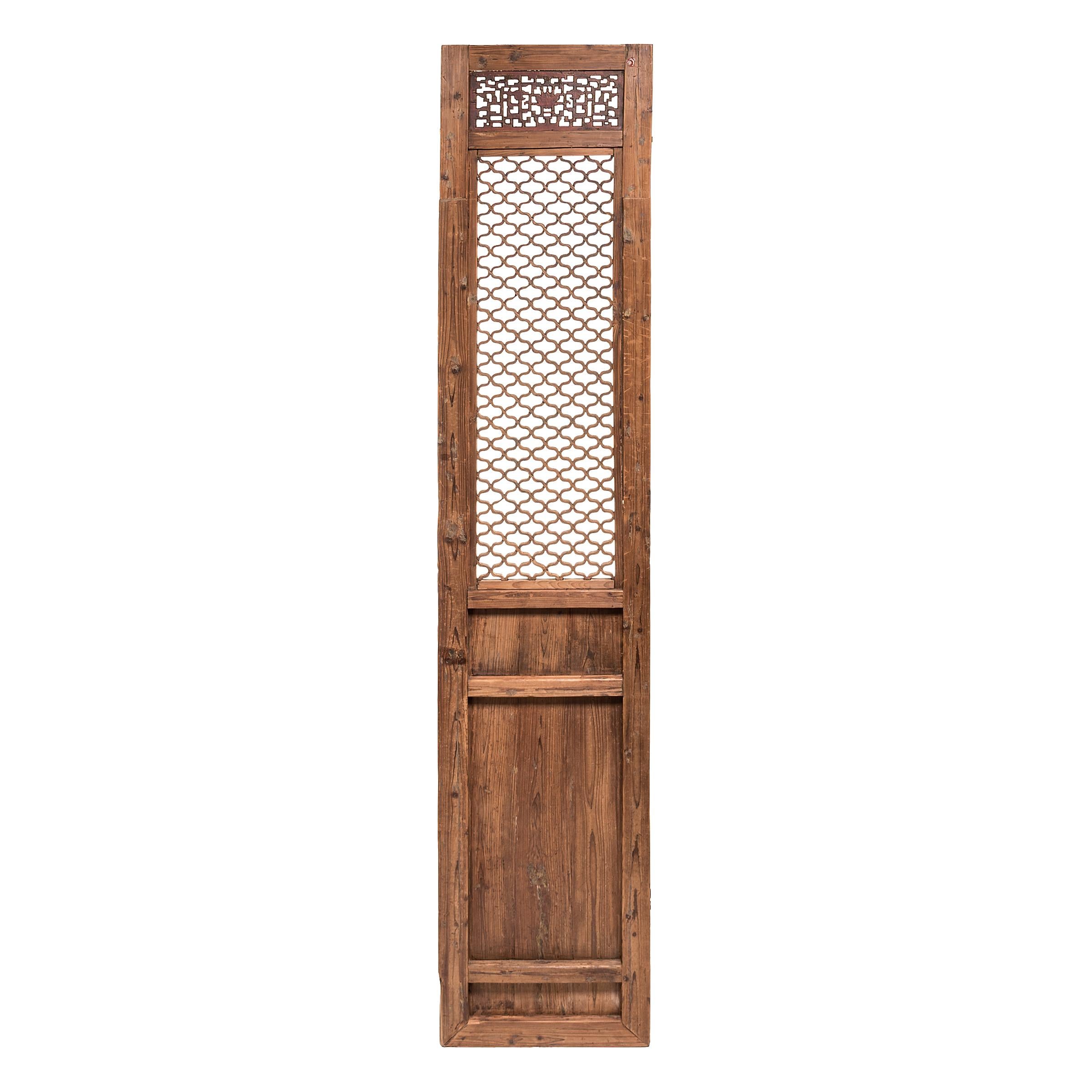 This elegant, 19th-century door panel evokes life in a traditional courtyard home, where the openwork lattice design allowed light and air to flow into the inner rooms while maintaining privacy for its occupants. Creating lattice was a geometric