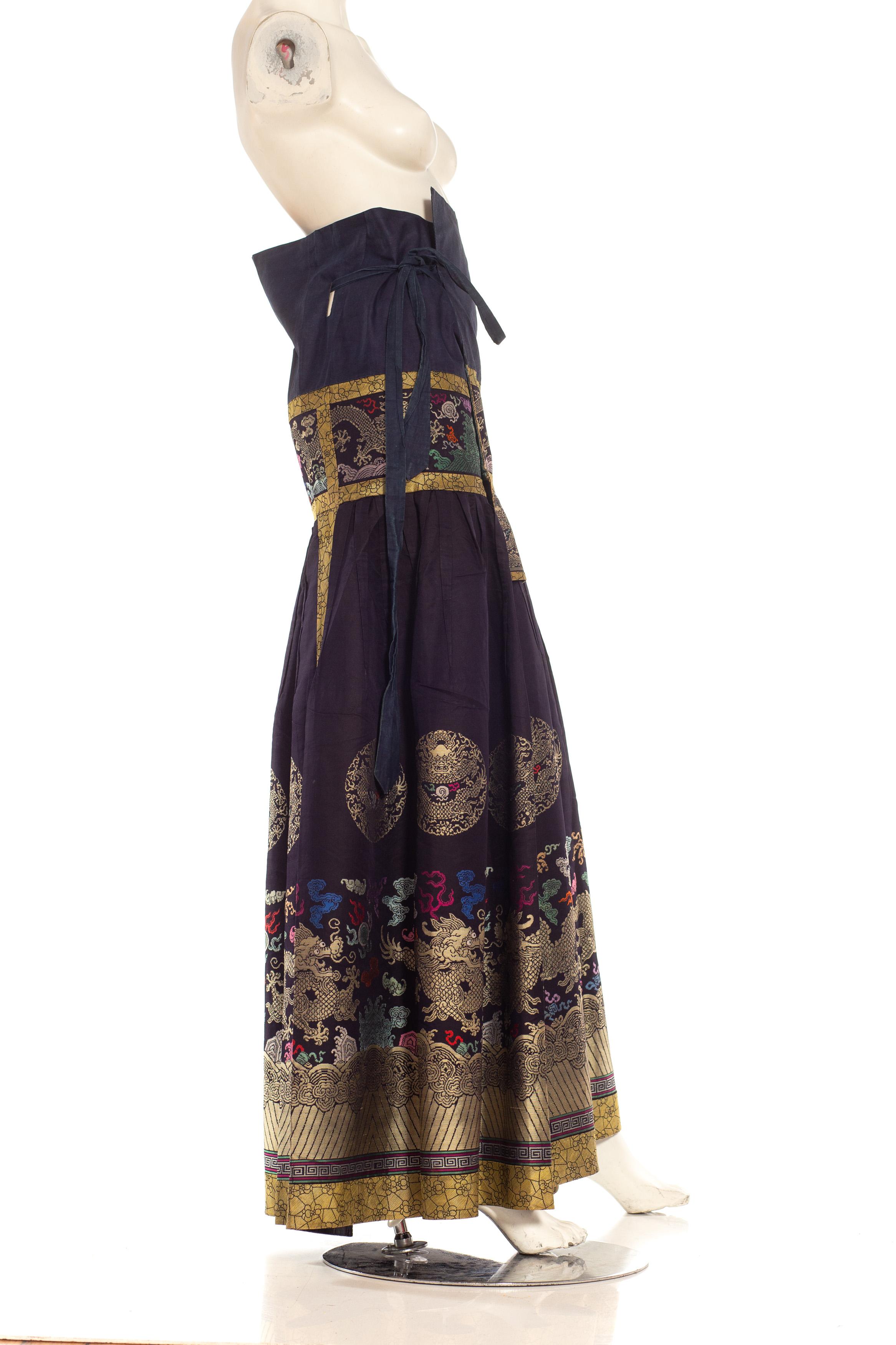Navy Blue Multicolored Chinese Skirt


Pleated navy silk and multicolor with tie belt; depicts medallions and auspicious symbols with five-clawed dragons, fire, “flaming pearl of wisdom”, clouds, lishui waves, bats
