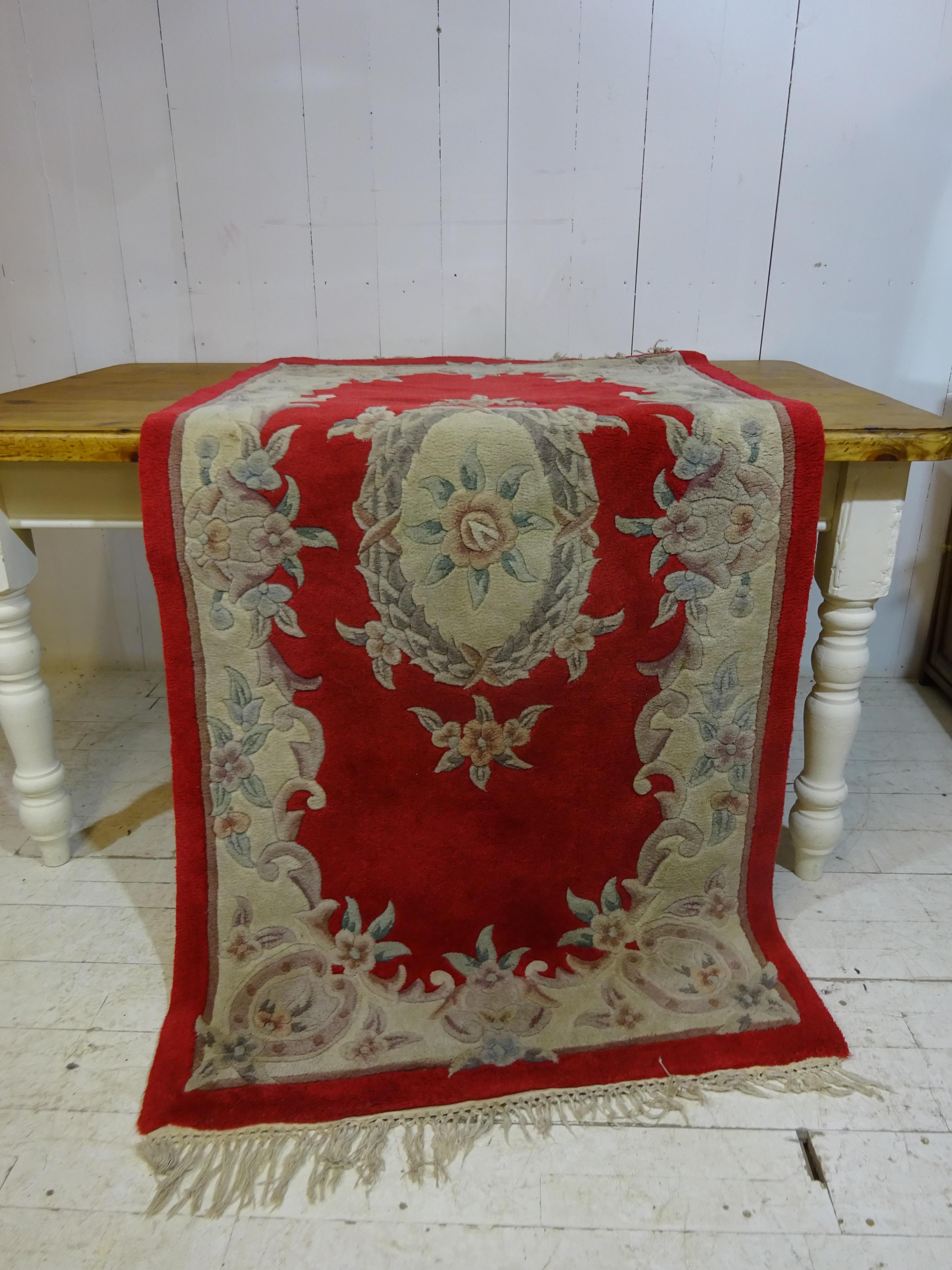 In the same family since new this rug was one of over 20 rugs imported in the mid 1920's from China. We have managed to source most these fabulous rugs which are ideal for any room.

The rug is pure wool and is carefully woven to provide a thick