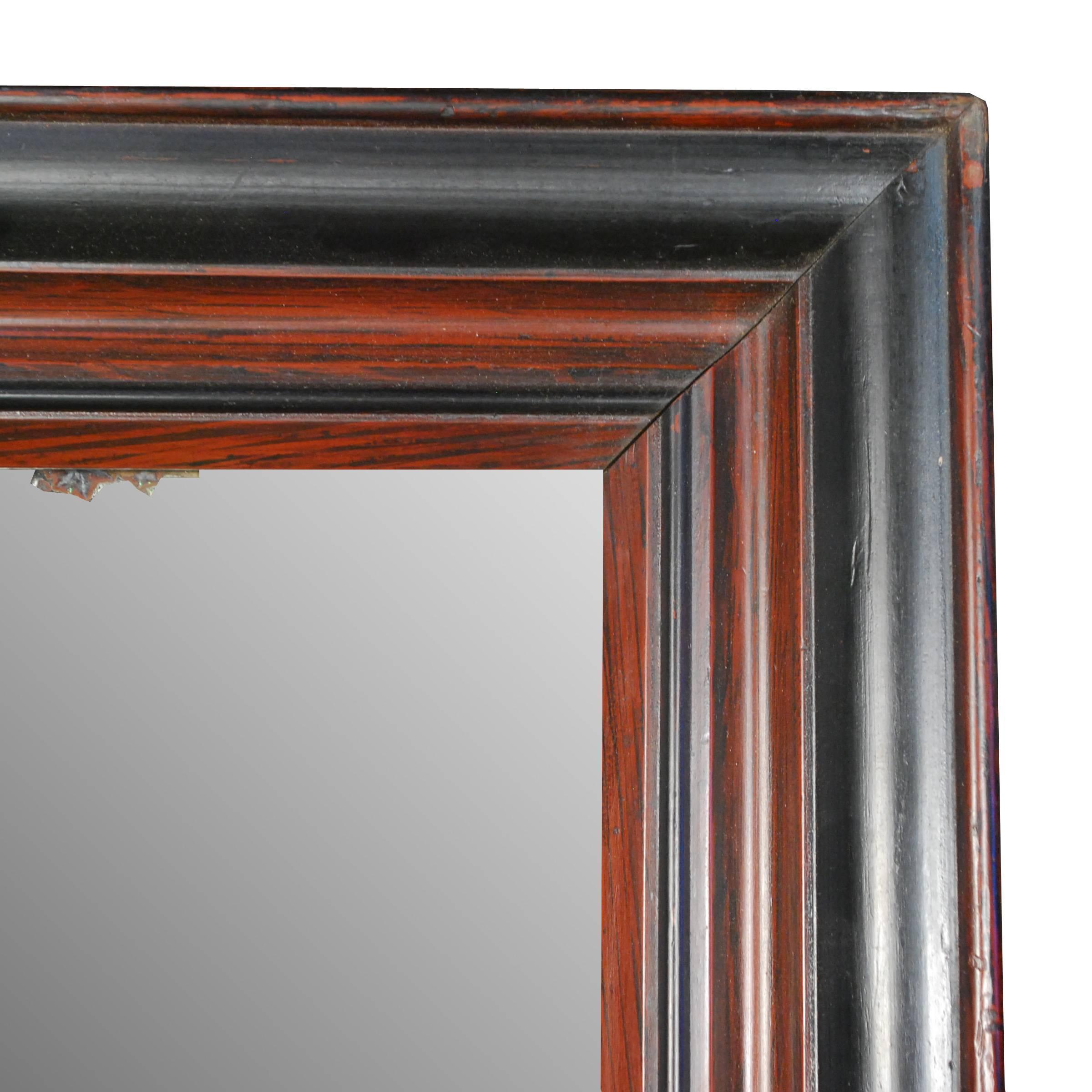 This early 20th century Chinese mirror has maintained its original 