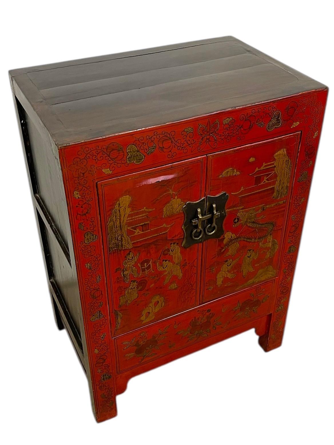 Mid-Century Modern Chinese Red Cabinet with Gilt Figural and Dragon Motifs For Sale