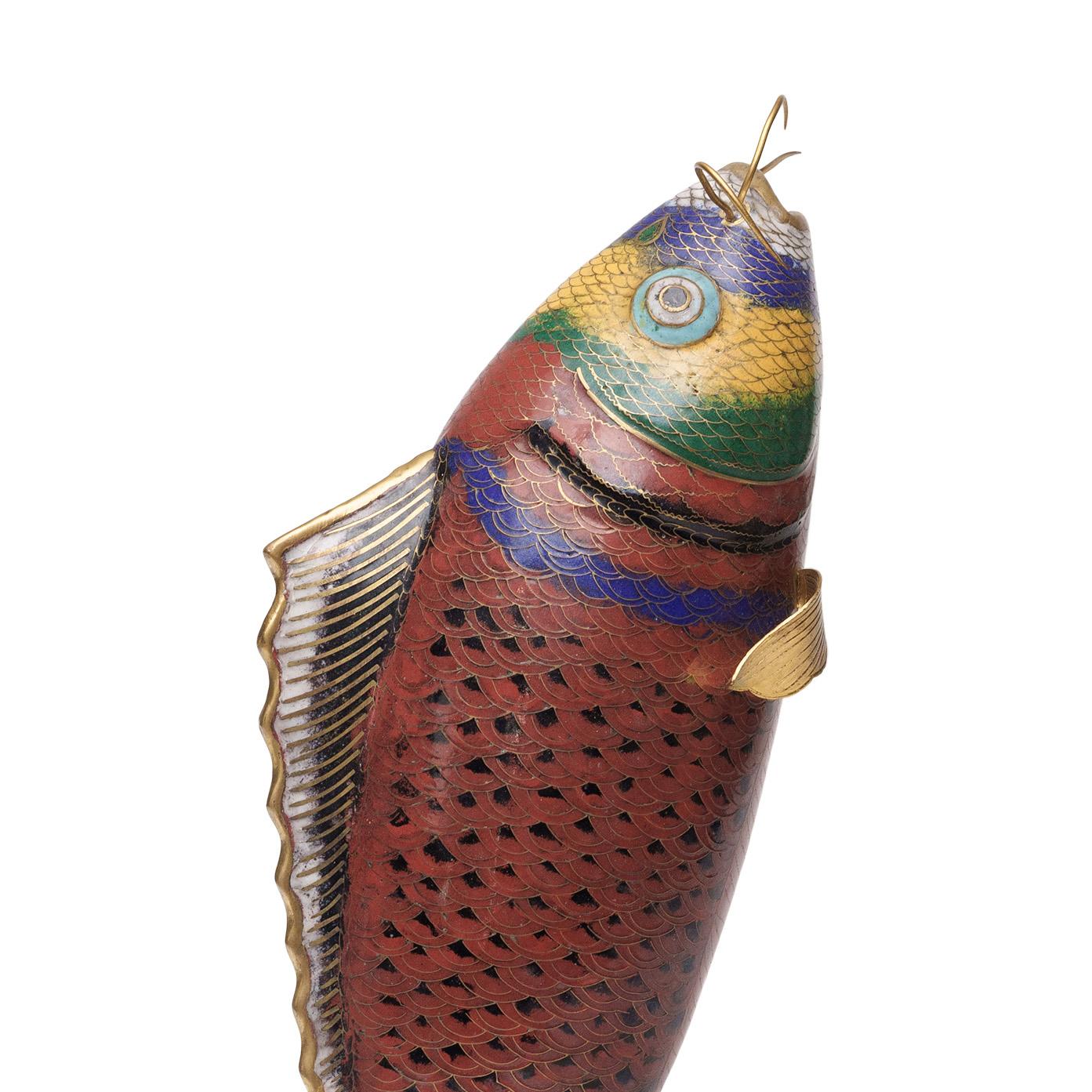 A decorative technique first adopted in China in the early Ming dynasty (1368-1644), cloisonné is achieved by outlining intricate patterns with thin strips of metal, which are then filled with colorful materials such as vitreous enamel, cut glass or