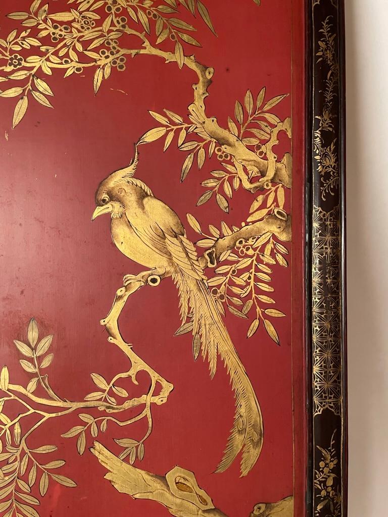 Chinese Export Chinese Red Lacquer and Gilt Panel with Bird in a Tree, Black and Gilt Frame