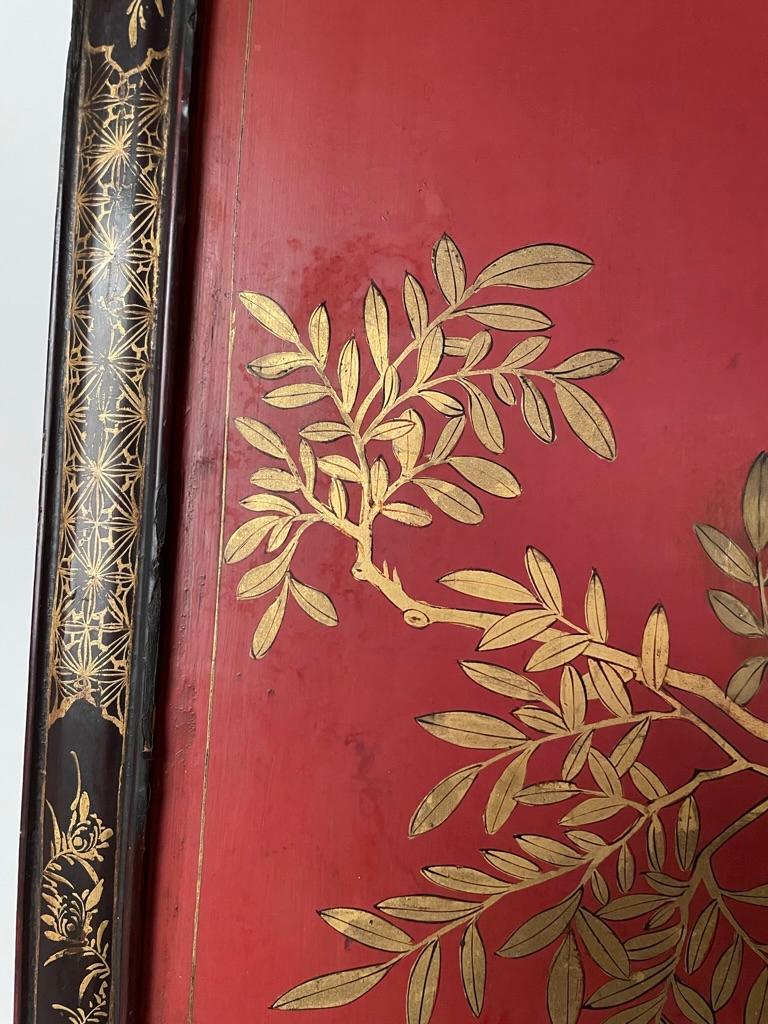 Chinese Red Lacquer and Gilt Panel with Bird in a Tree, Black and Gilt Frame In Good Condition In Stamford, CT