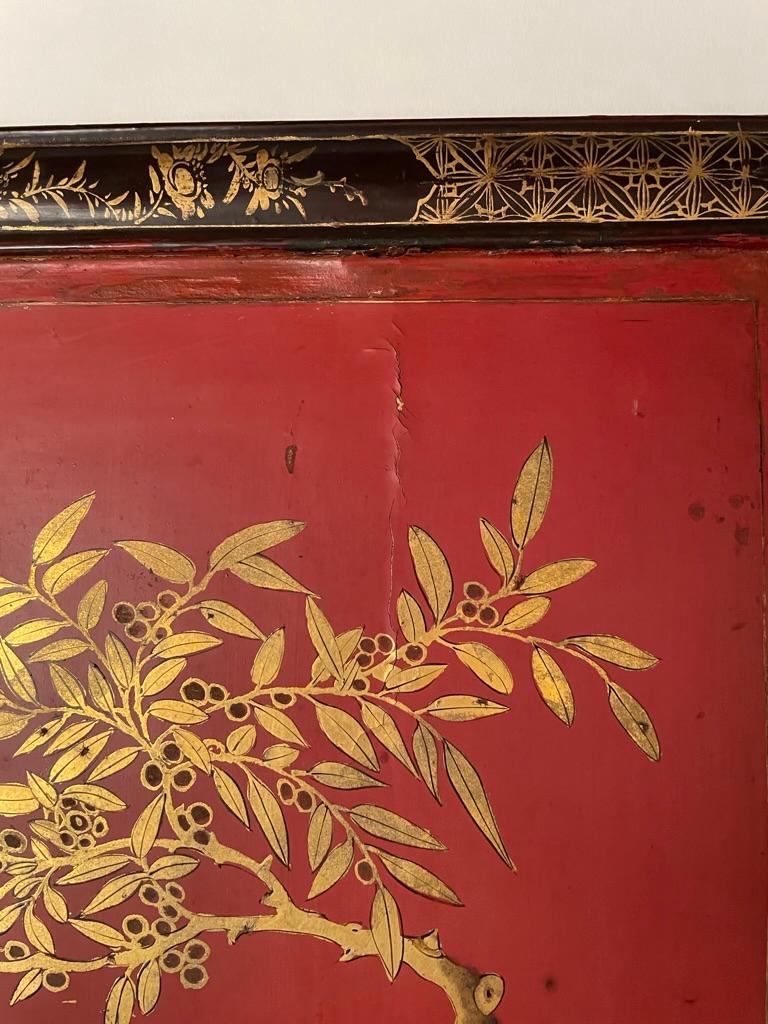 Wood Chinese Red Lacquer and Gilt Panel with Bird in a Tree, Black and Gilt Frame