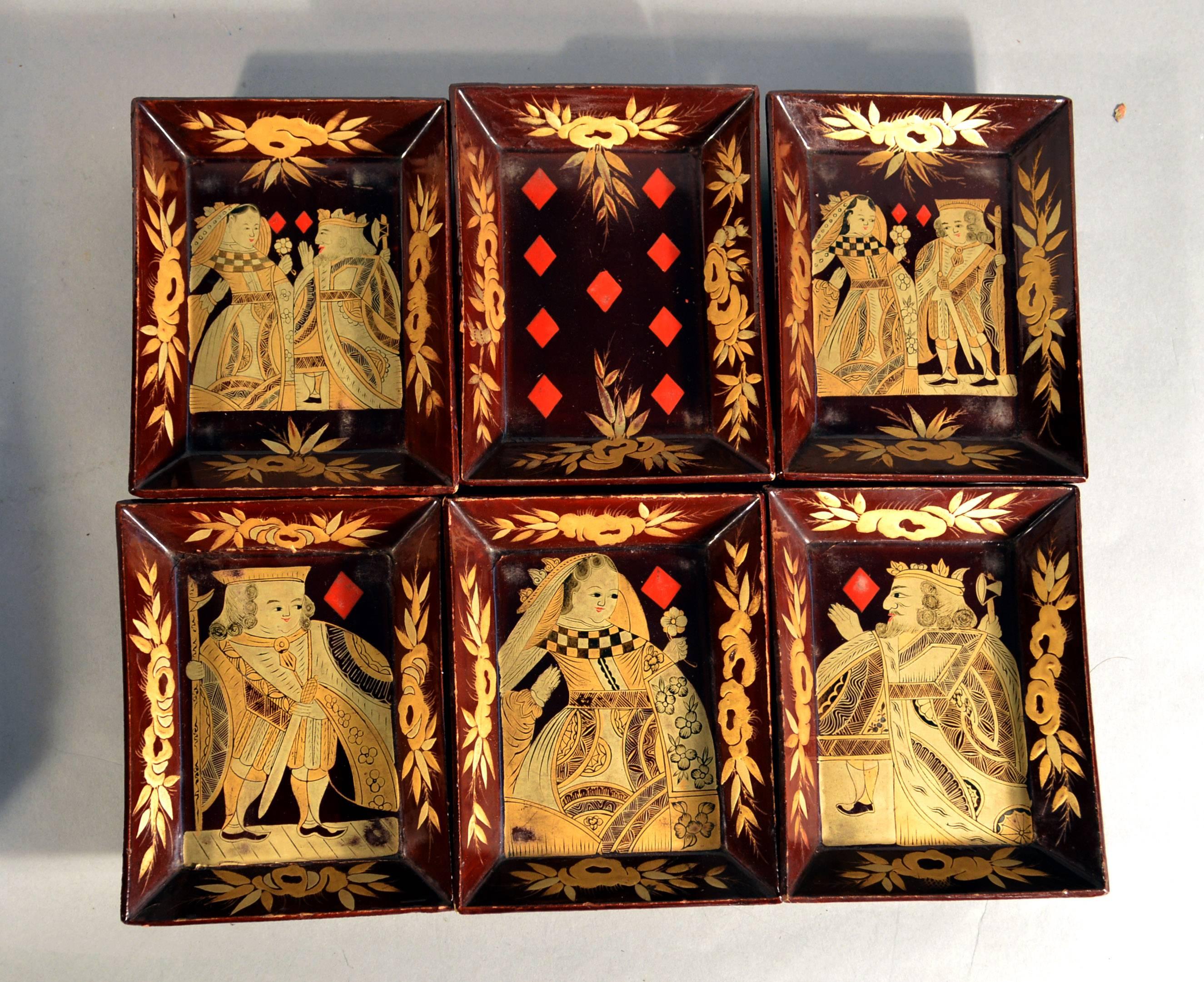 Chinese red lacquer covered games box with inner trays and boxes, 
circa 1825-1850.

A fine rare Chinese red lacquer games box with a removable cover decorated overall with a central Chinese landscape with pagodas and with a dragon border