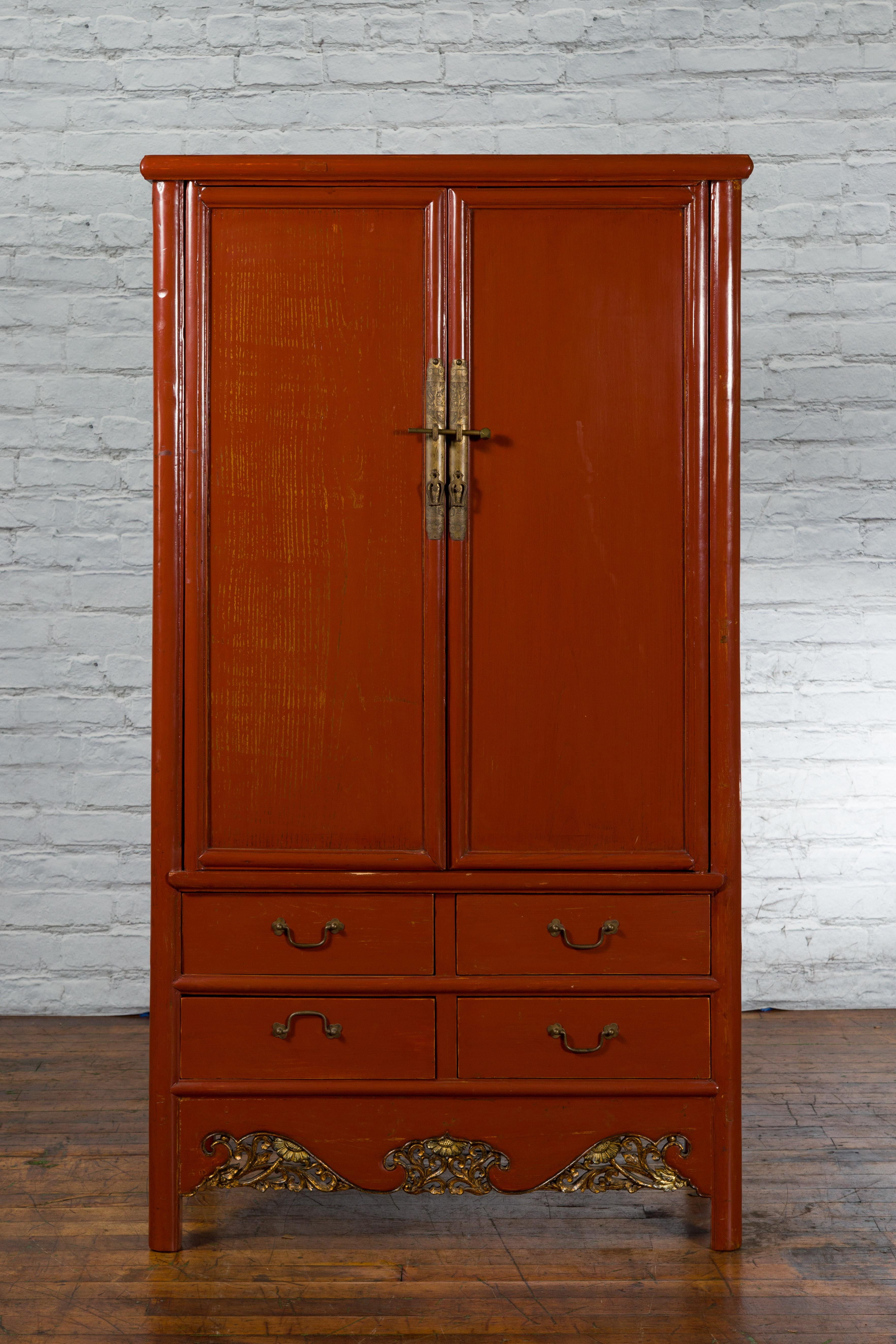 Qing Chinese Red Lacquer Ming Dynasty Style Cabinet with Floral-Carved Gilt Apron For Sale