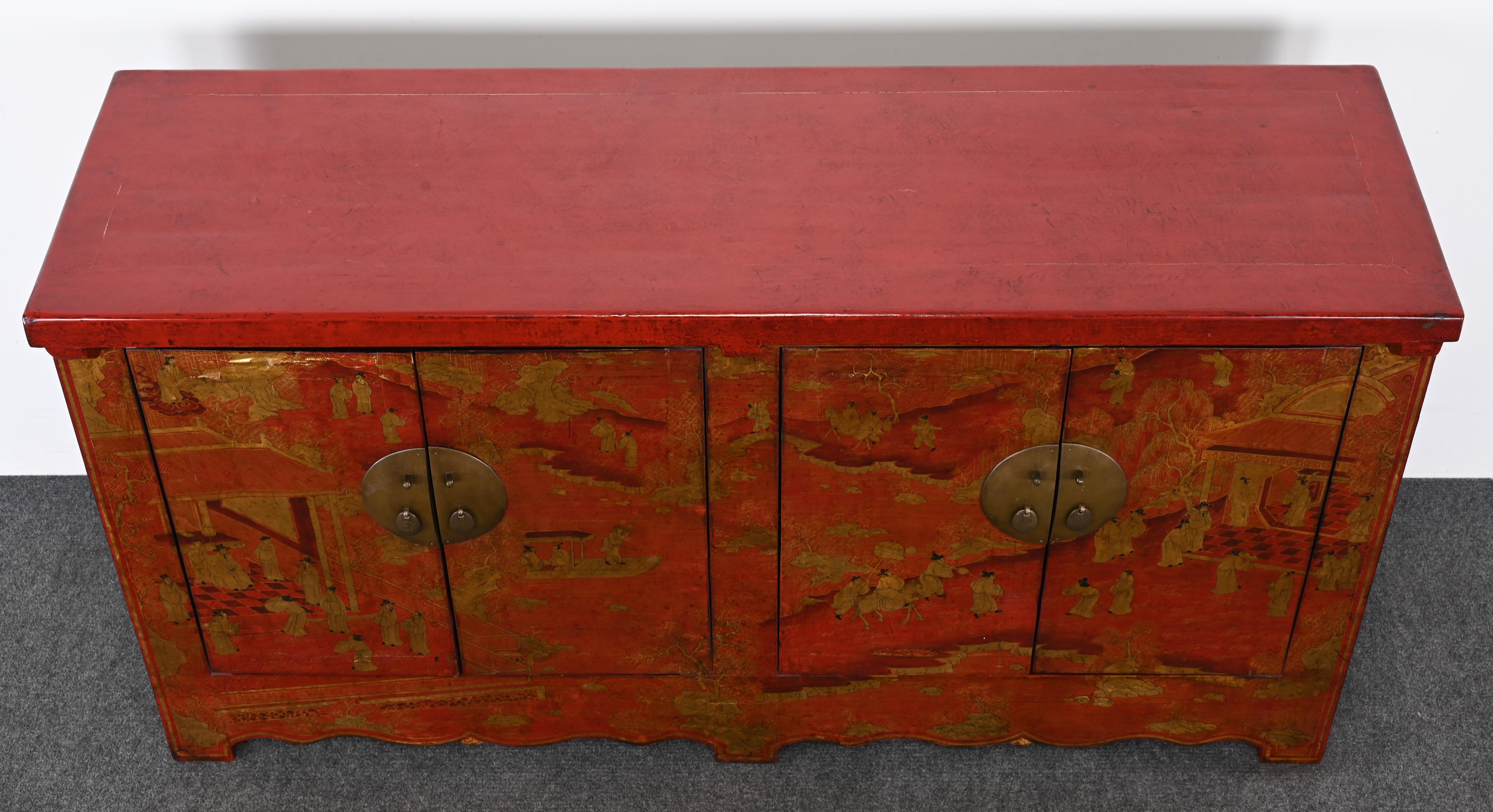 A handsome late 20th-century Chinese Reg Lacquer Cabinet or Sideboard in the Qing Style. This credenza has a nice size and scale, functional space, and ample storage. The cabinet would work well in almost any room and can be used for records, china,