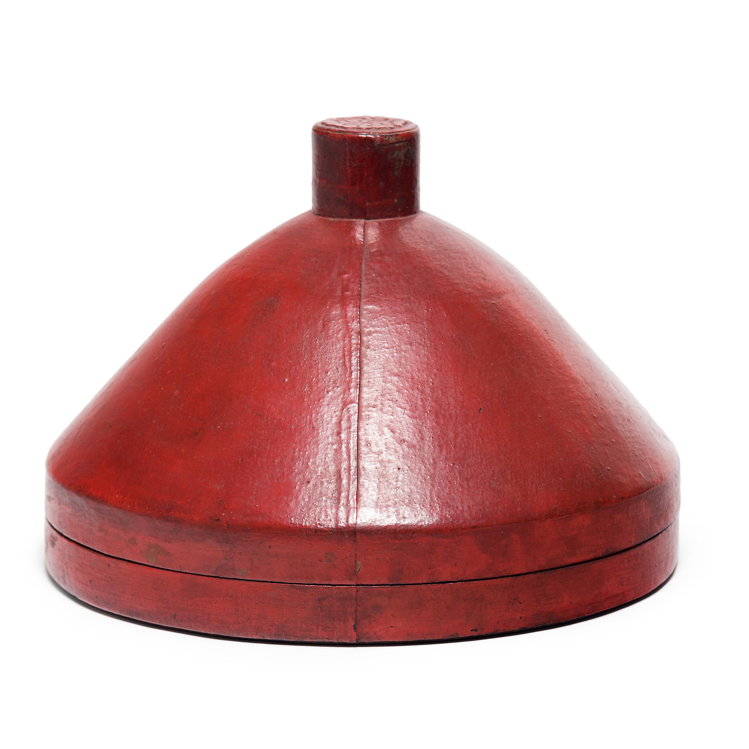 No self-respecting man in Qing-dynasty China would leave the house without some kind of hat. In fact, headgear was so central to social status that even the containers used to store one's hat were beautifully constructed.

This pointed hat box