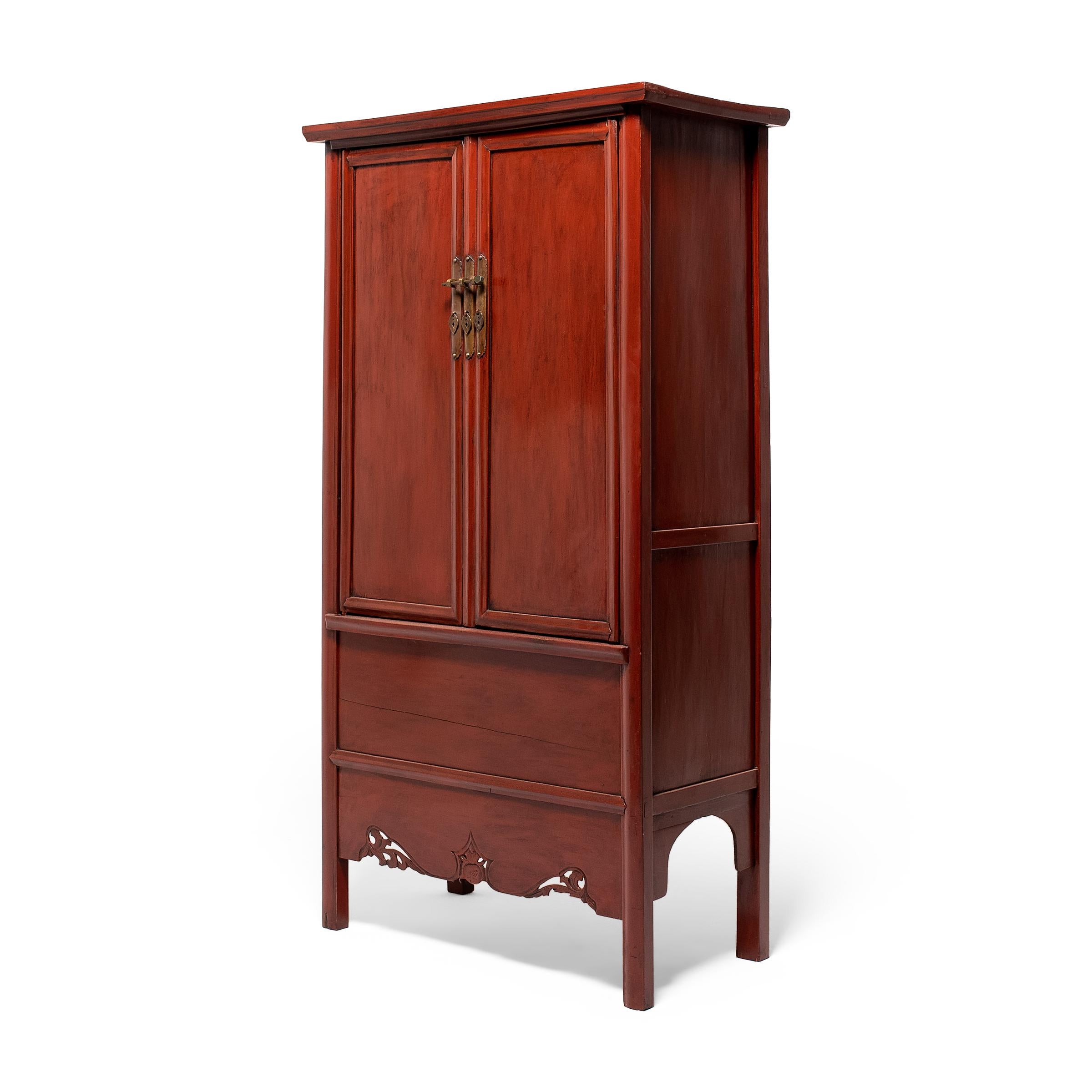 A classic piece of Chinese furniture, large, upright cabinets such as this were used in traditional homes in lieu of built-in closets, filled with clothing, bedding, and other household goods. Dated to the 19th century, this example is crafted in