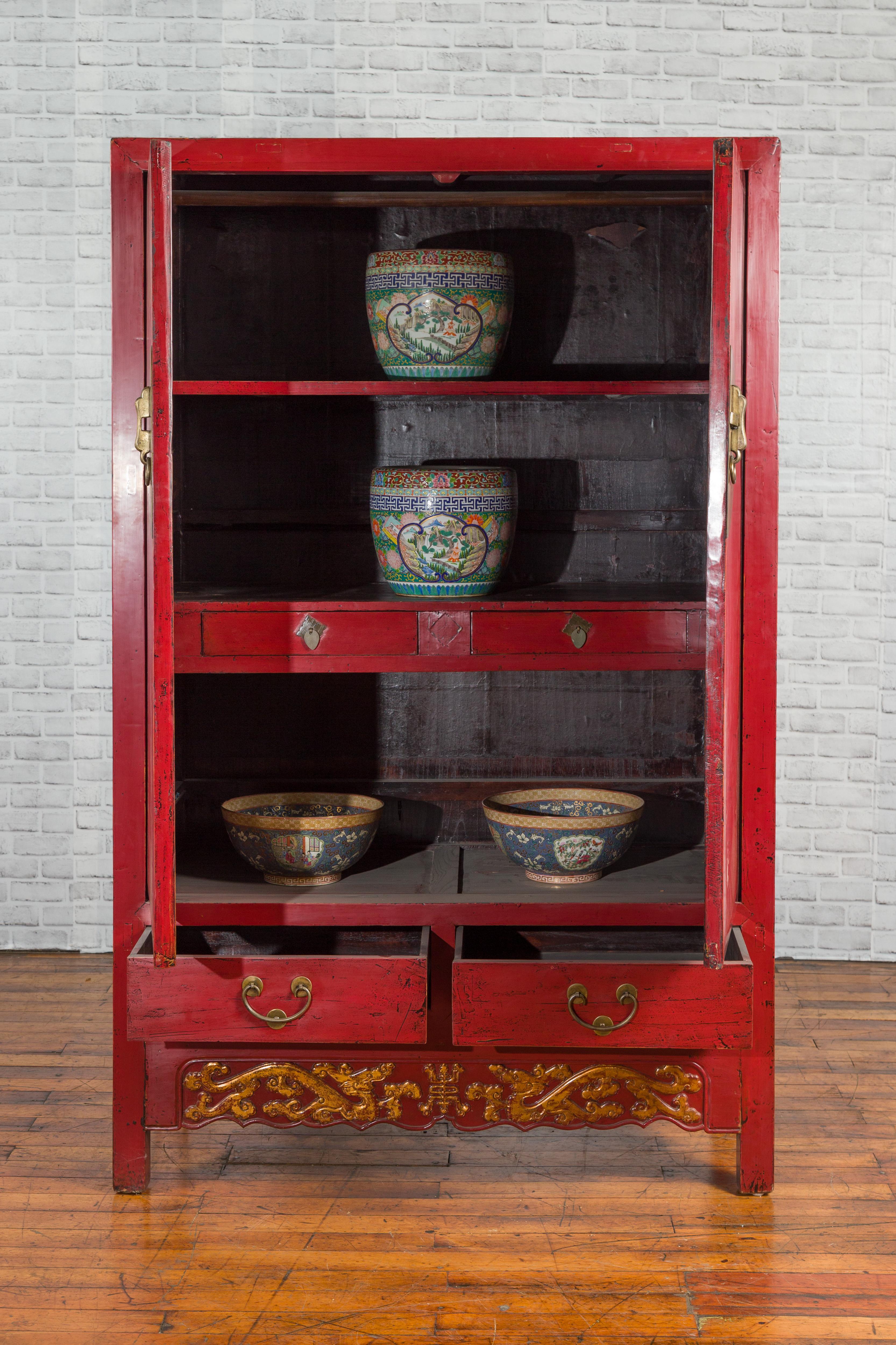 Wood Chinese Red Lacquered Qing Dynasty 19th Century Cabinet with Carved Gilt Apron For Sale