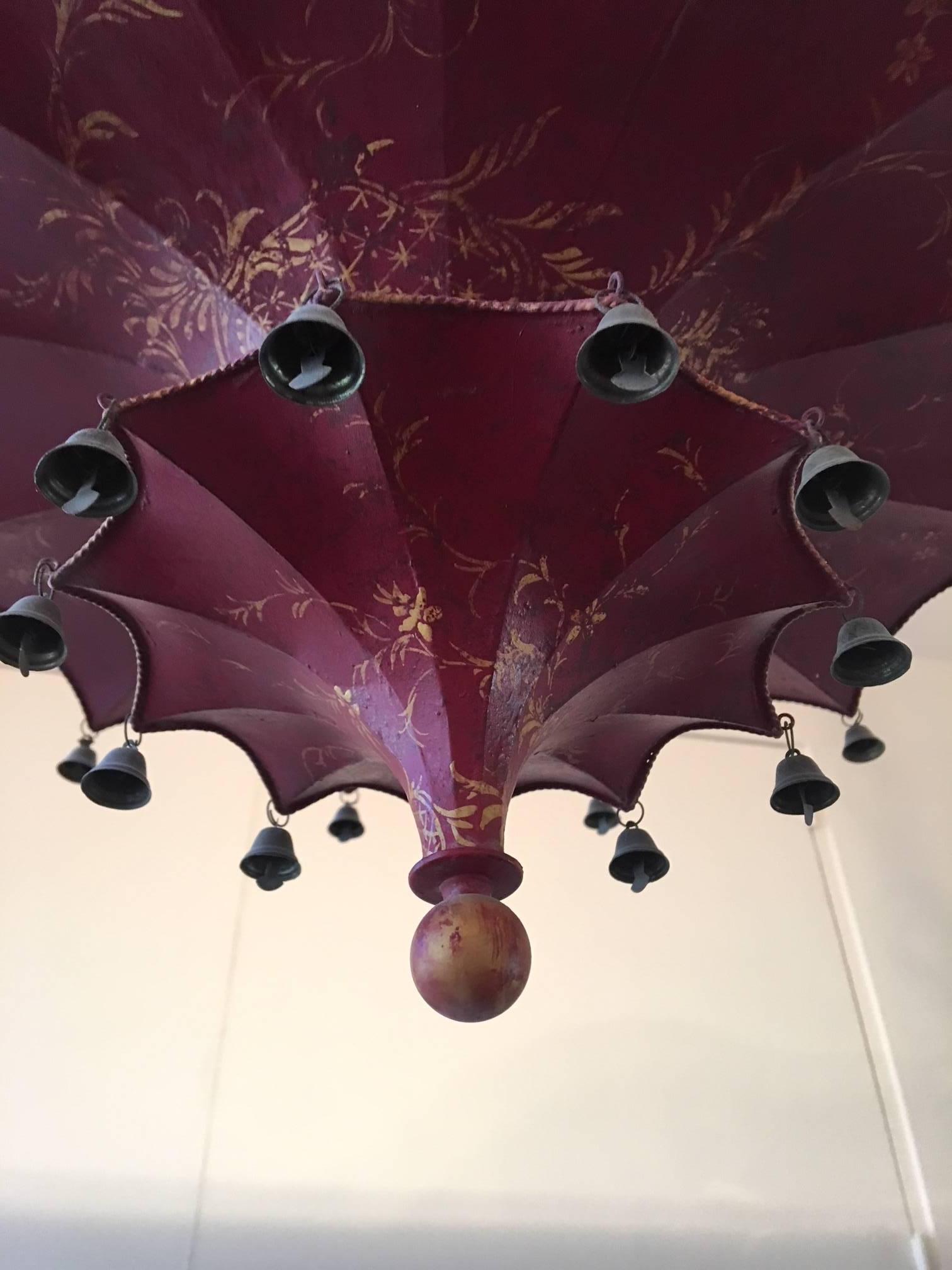 Chinese red Pagoda style four-light hanging light fixture by John Rosselli, 20th century.