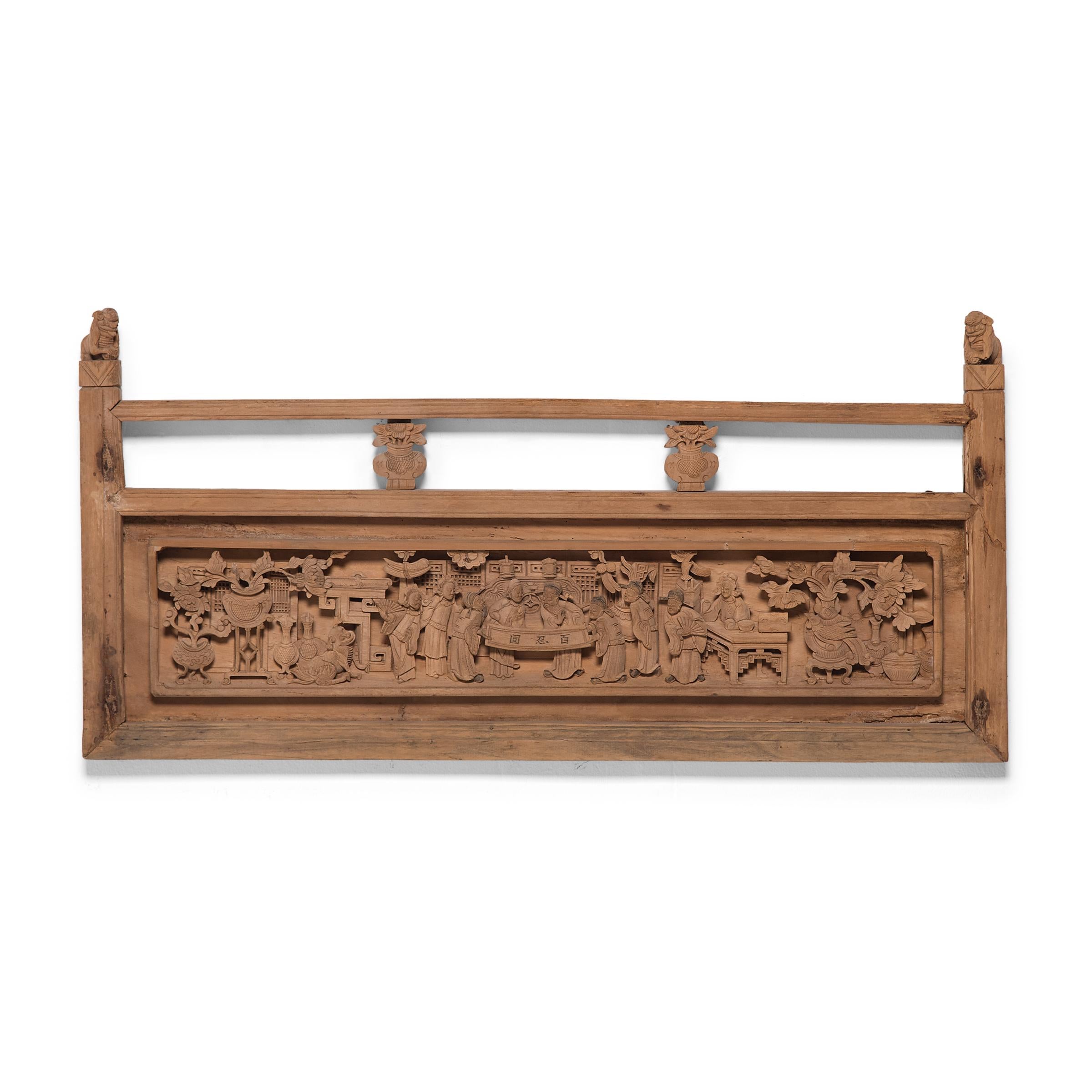 These carved wooden panels were once a part of the railing to a grand Qing-dynasty daybed or canopy bed enclosure. Expertly crafted, the panel displays a beautiful relief carving with intricate details of various robed figures gathered around a
