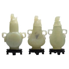 Chinese Republic Period Carved Pale Green Hardstone Vases with Foo Lion Finials