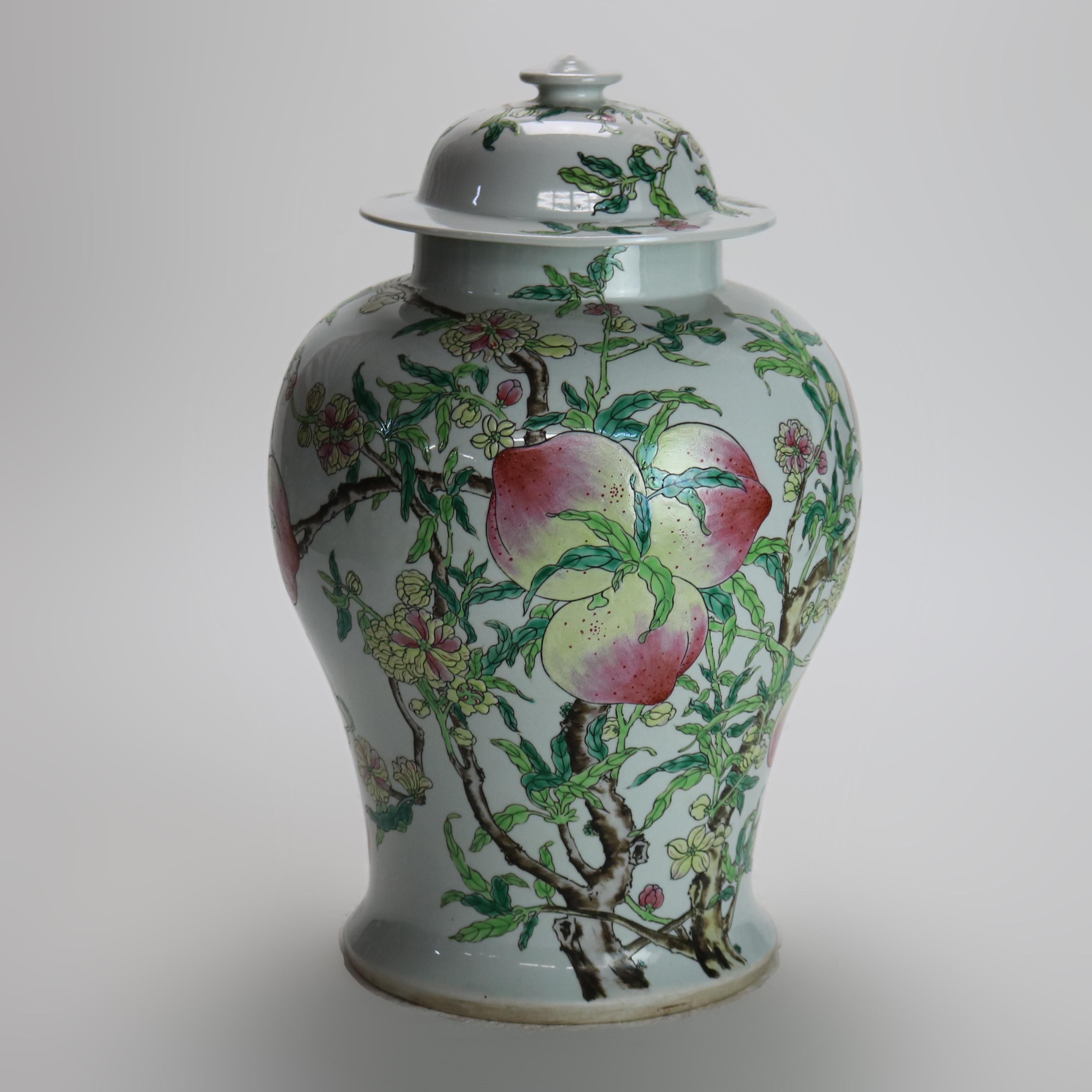 Chinese Republic Period Porcelain Covered Longevity Ginger Jar with Peaches 20thC.   
Measures - 16 3/4