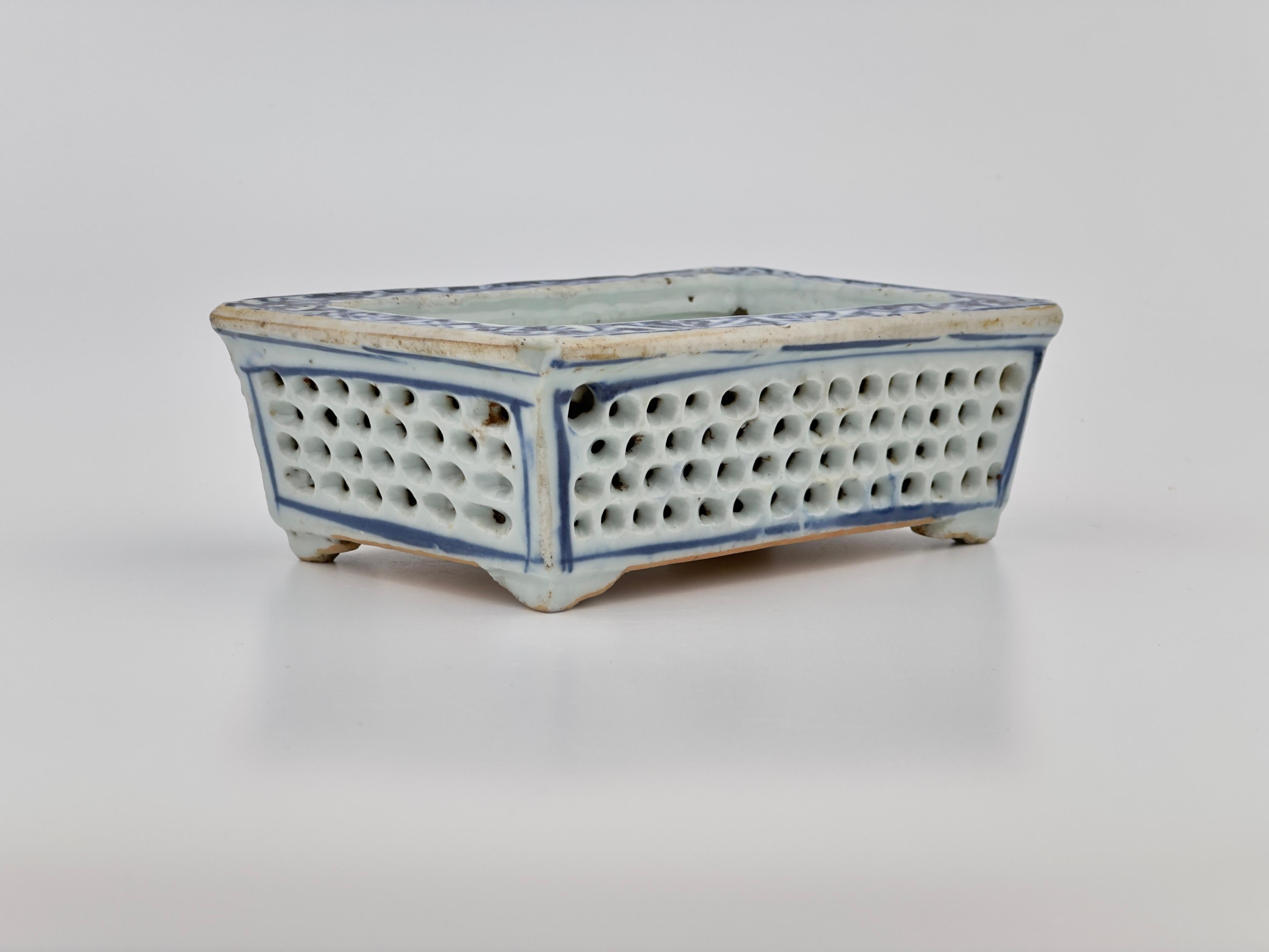 Early Qianlong Period Painted Chinese Export Reticulated Pierced Blue and White Porcelain Double Walled Shallow Planters of Rectangular Outline. Circa last quarter of the Eighteenth Century. Each finely hand decorated on all outer panels and top