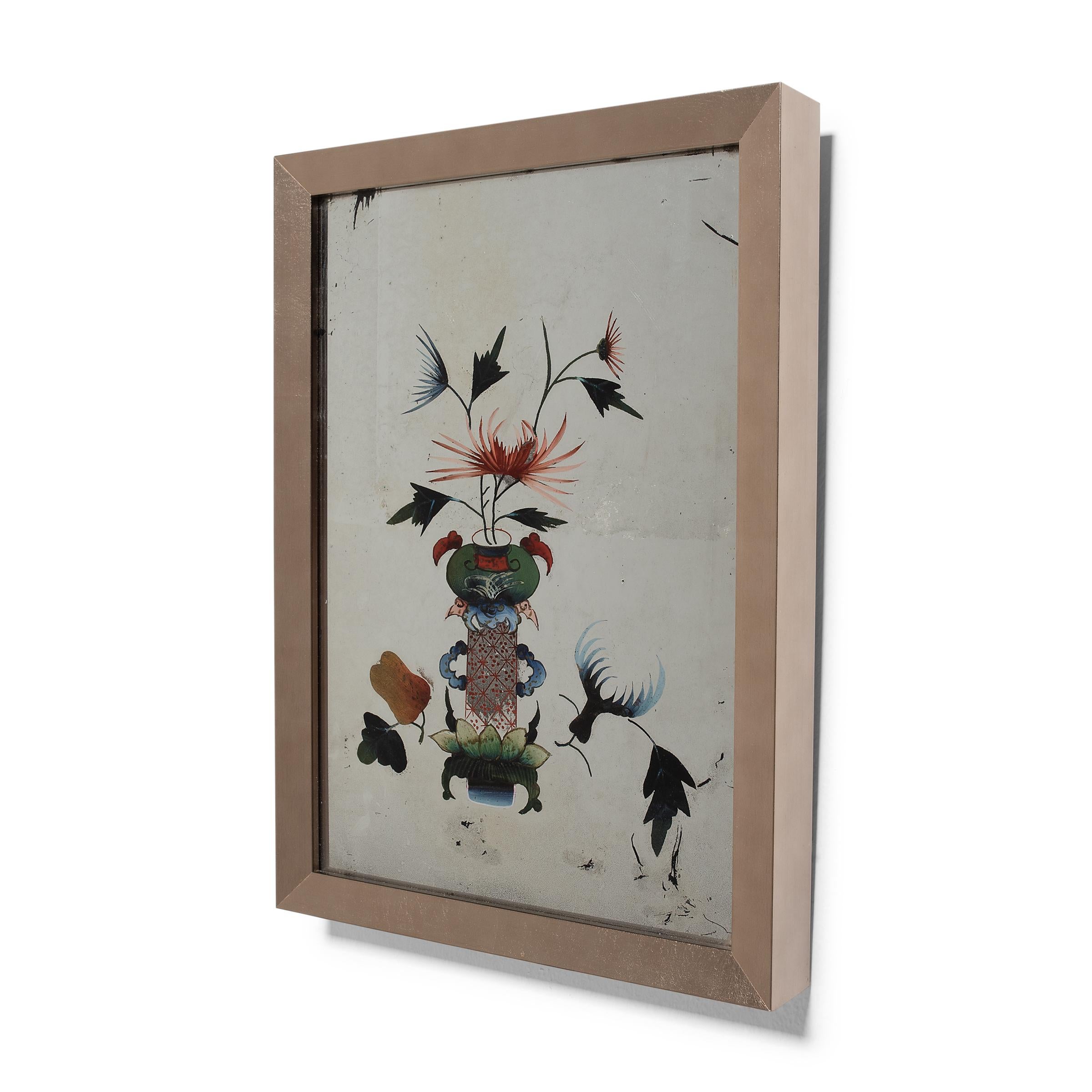 This colorful floral still life is a charming example of Chinese reverse glass painting. Popularized during the Qing dynasty, reverse glass painting requires an artist to essentially work backwards, starting with details and shading before adding