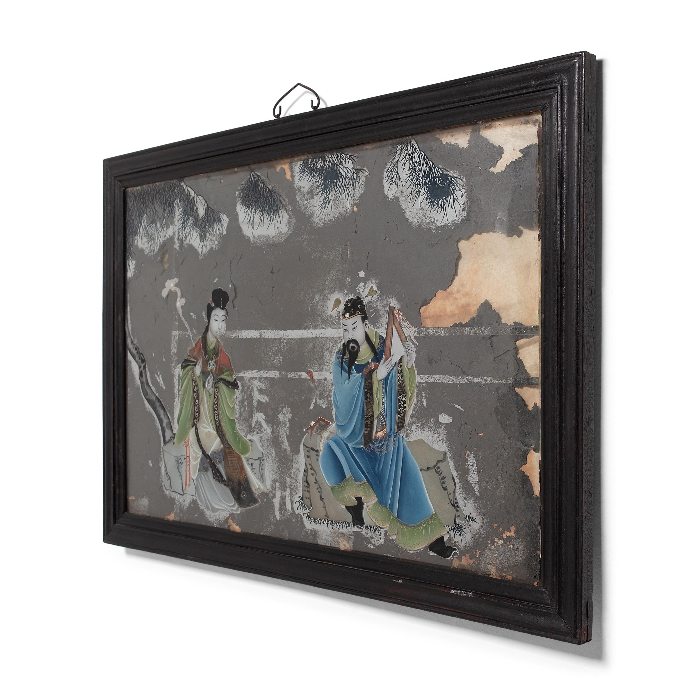 Popularisée sous la dynastie Qing, la peinture sur verre à l'envers exige de l'artiste qu'il travaille essentiellement à l'envers, en commençant par les détails et les ombres avant d'ajouter la couleur et la forme. Cette technique exigeante, qui ne