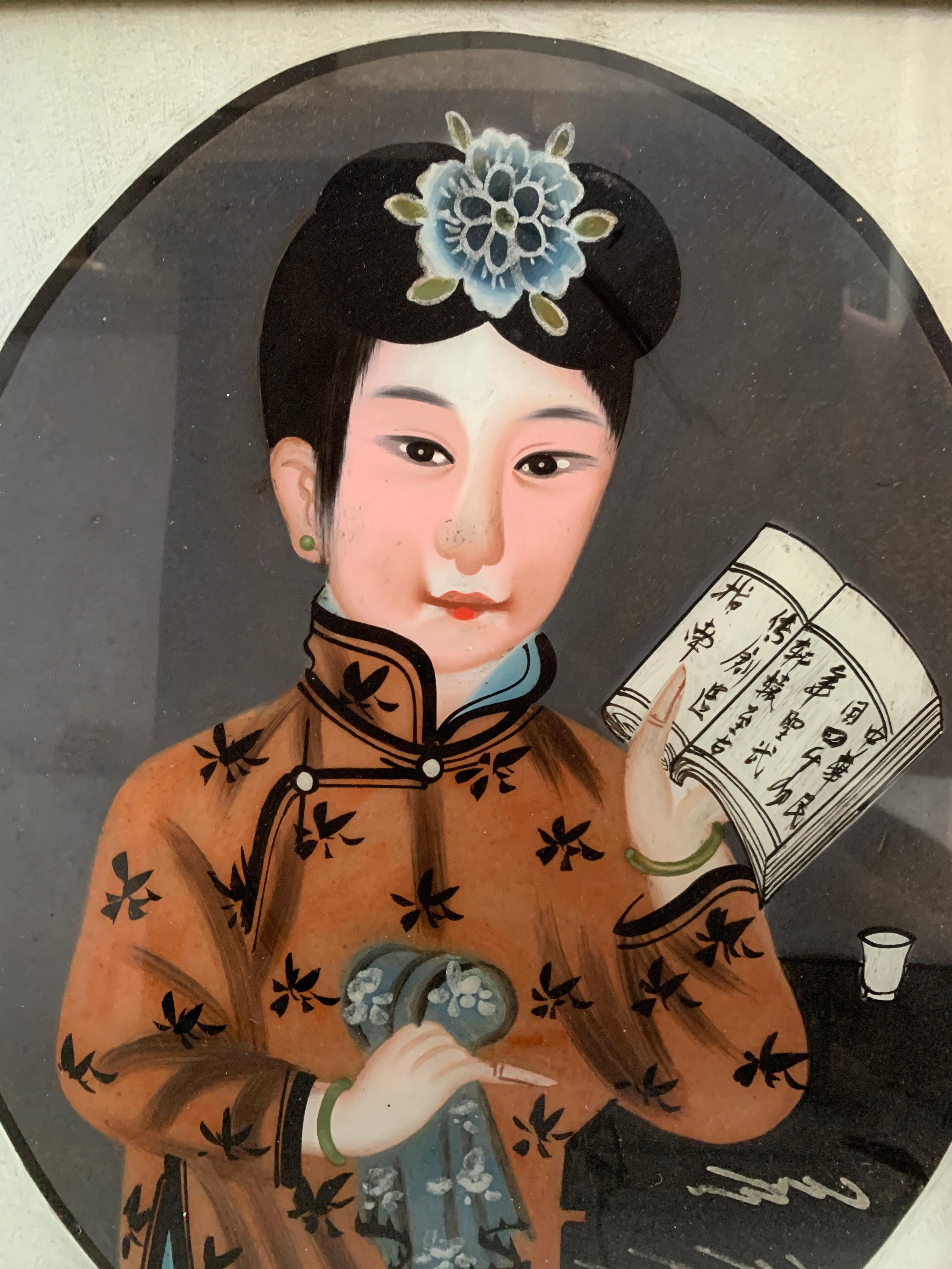 This Chinese portrait depicts a young woman and was painted using a reverse glass painting technique. Painting in reverse on the opposite side of a piece of glass meant the painter had to work in reverse.
   