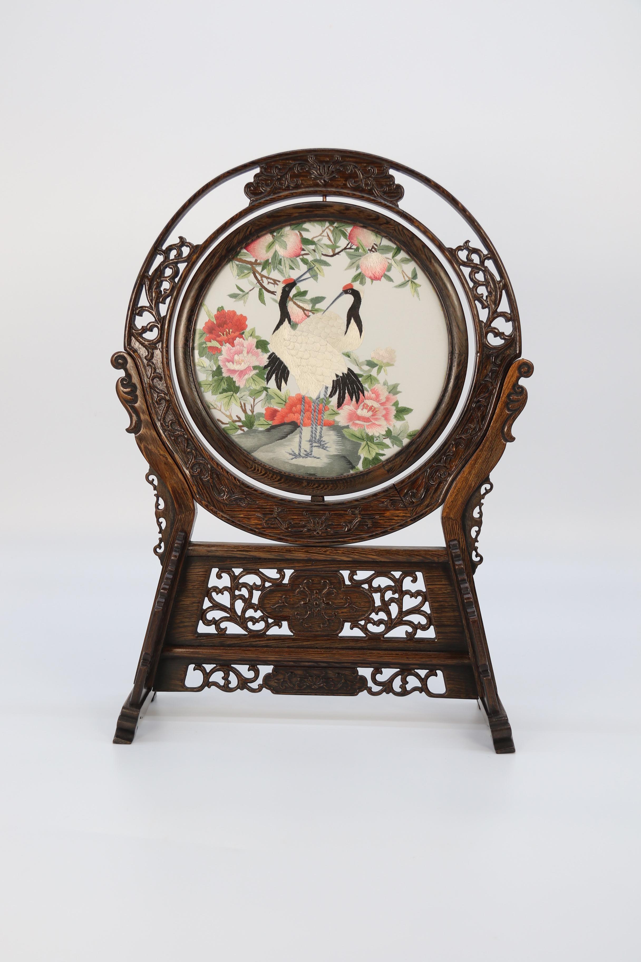 Chinese Chippendale Chinese reversible silk needlework in a fine carved hardwood stand circa 1920 For Sale