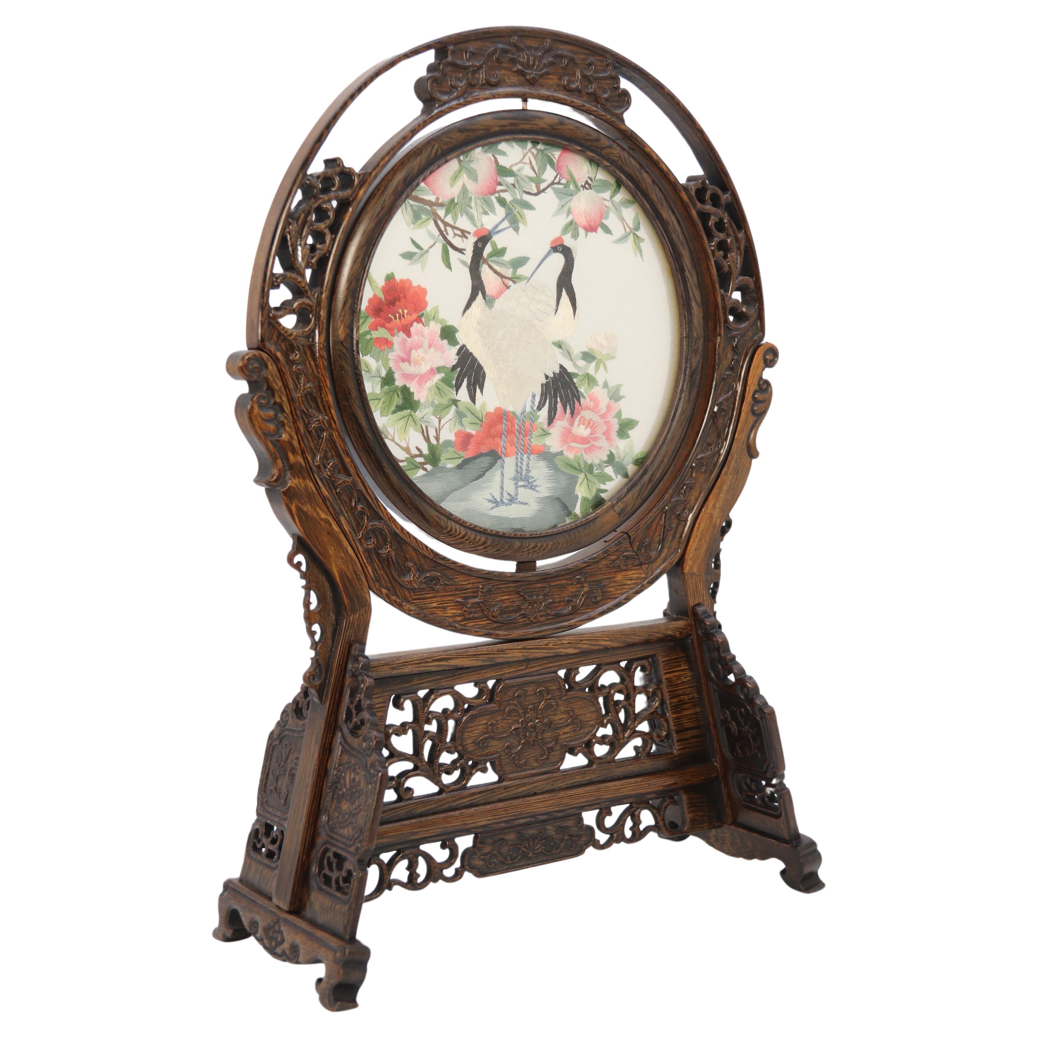Chinese reversible silk needlework in a fine carved hardwood stand circa 1920 For Sale