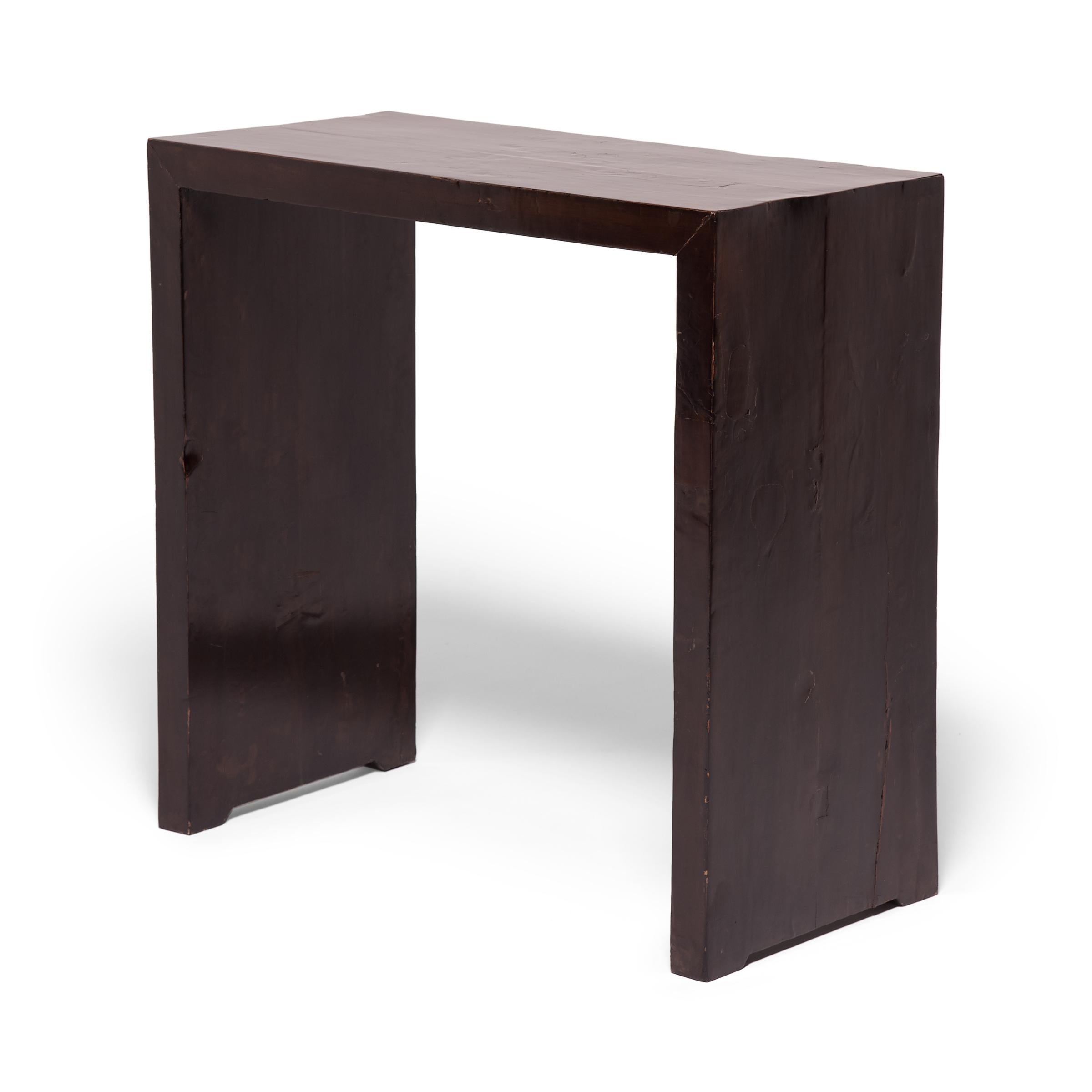 With no stretchers or spandrels, this elegantly simple table forms one beautiful, continuous ribbon the concealed joinery and fine finish add to this austere beauty. The contemporary table exudes an austere beauty, cloaked in a layer of dark lacquer