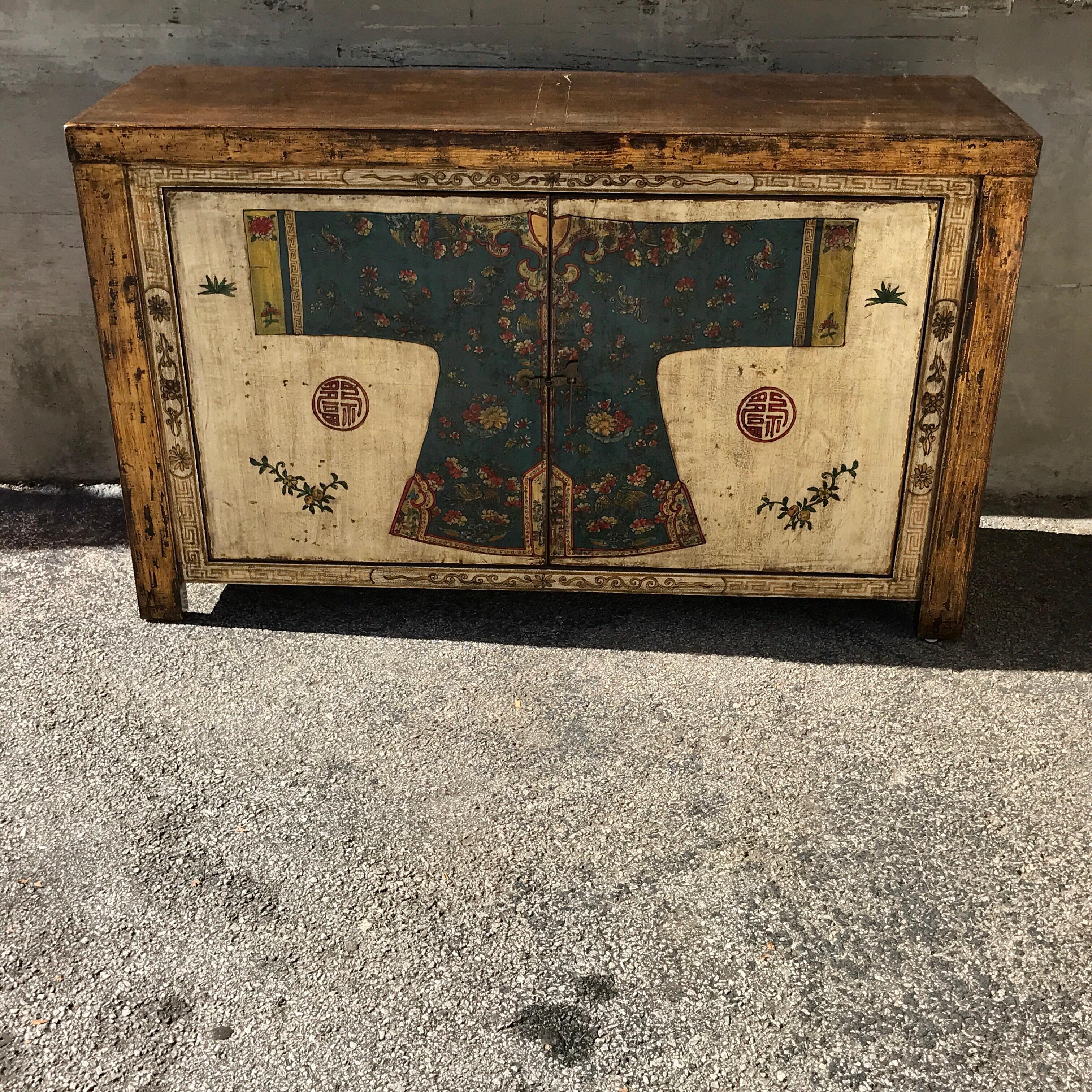 Chinese lacquered cabinet with Robe motif, exquisitely lacquered in thick gold and silver lacquer with multicolored polychromed decoration, fitted with two 23