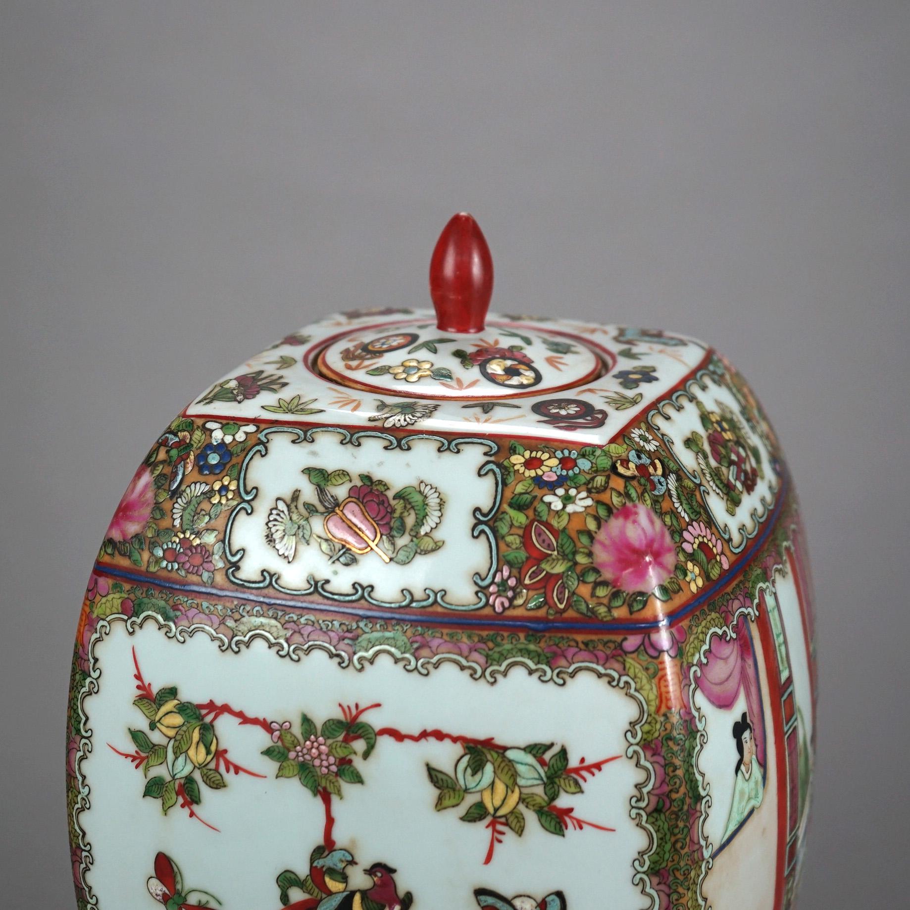 Chinese Rose Medallion Enameled Porcelain Lidded Urn with Garden & Genre Scenes, 20thC

Measures - 13 1/2