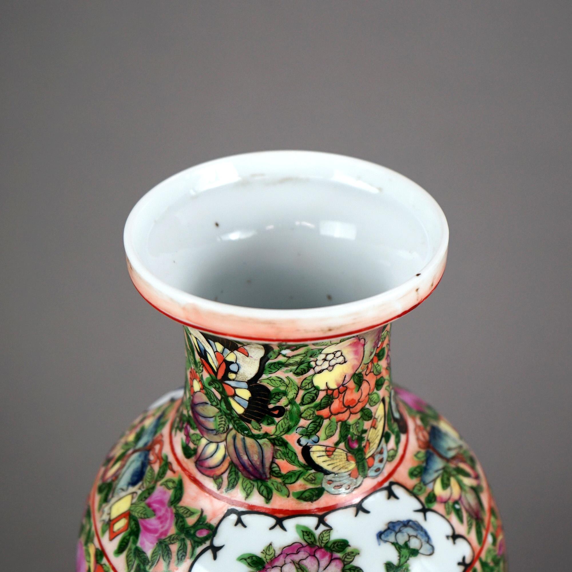 Chinese Rose Medallion Enameled Porcelain Vase with Butterfly Garden Scene 20thC

Measures - 14 1/8
