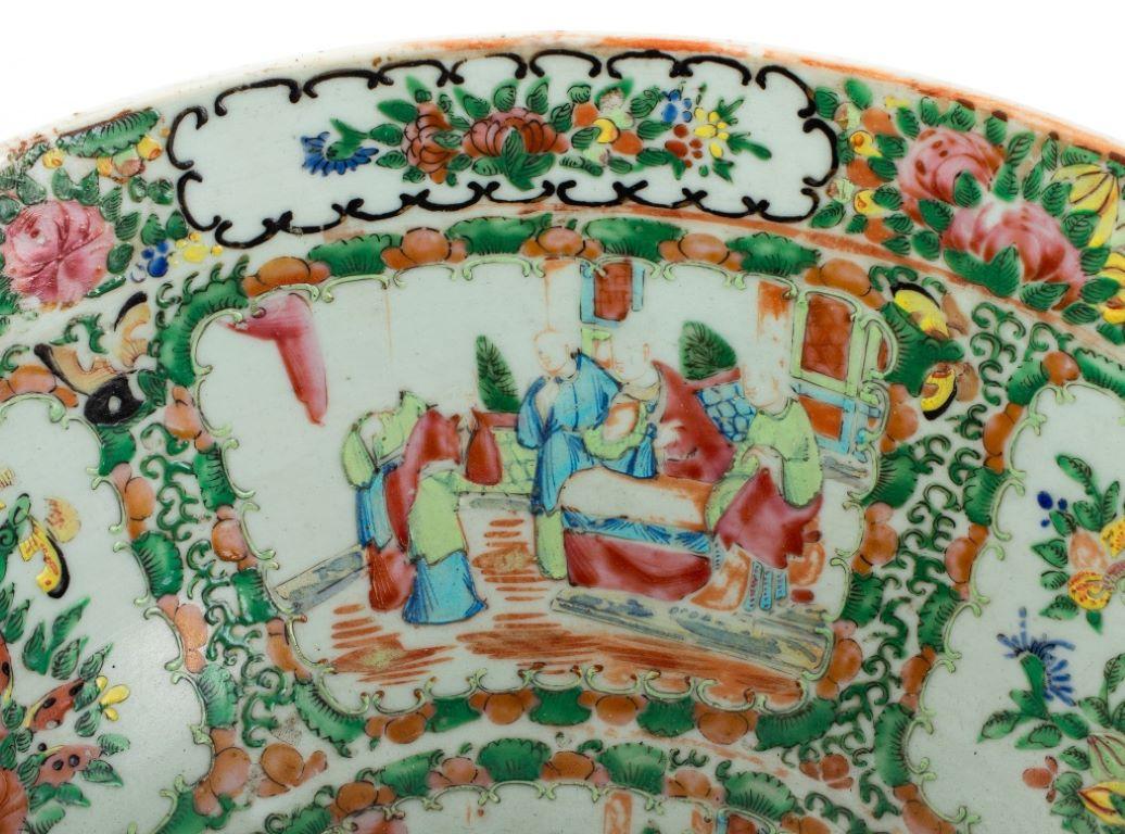 Chinese Rose Medallion Porcelain Punch Bowl, hand-painted with figures, birds, flowers, and butterflies.

Dealer: S138XX