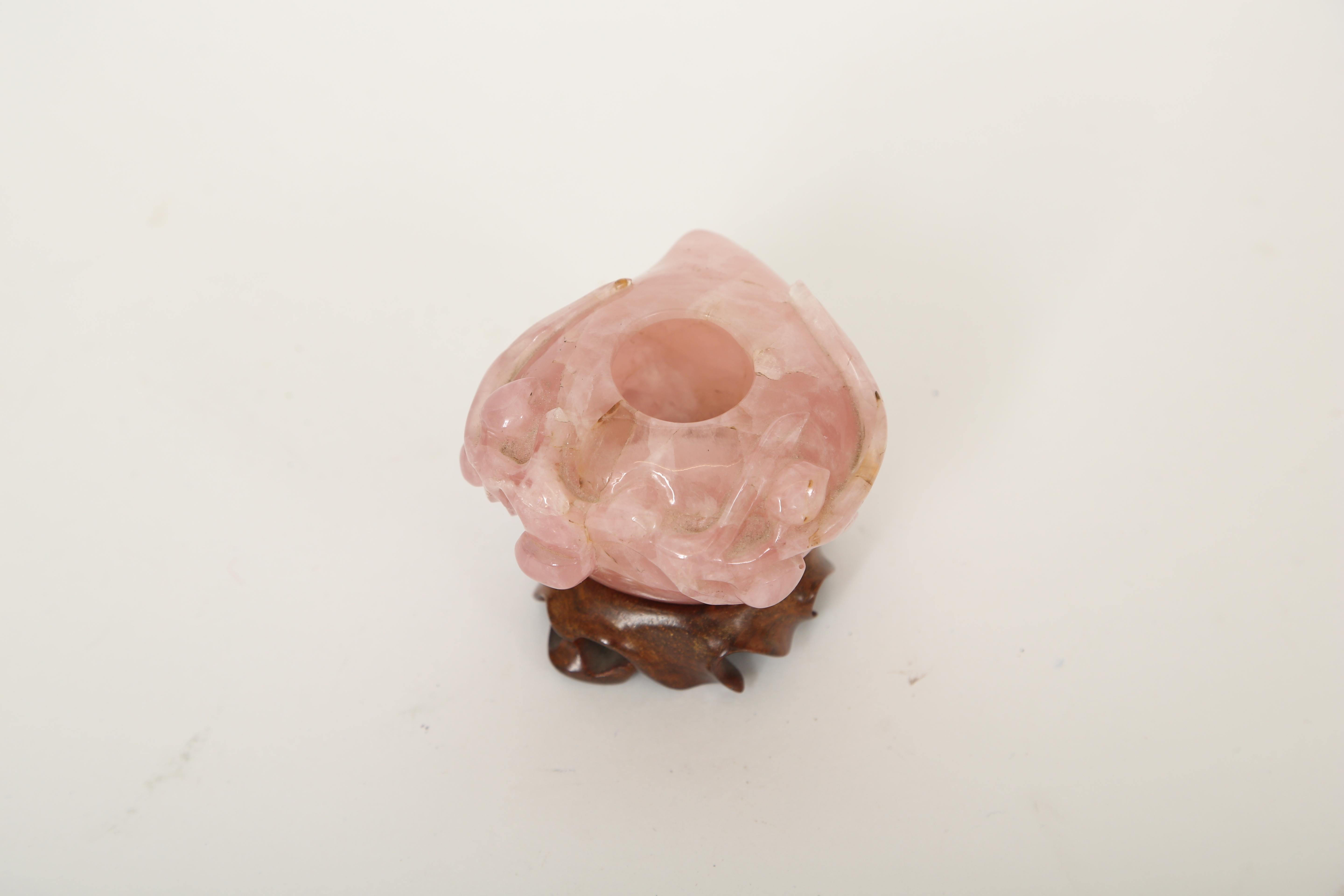 Chinese brush washer in the form of a peach, which represents wisdom. The peach is hand carved from rose quartz, a semi precious stone, and the stand was hand carved to fit. Whether you collect brush washers or just like beautiful objects this rosy