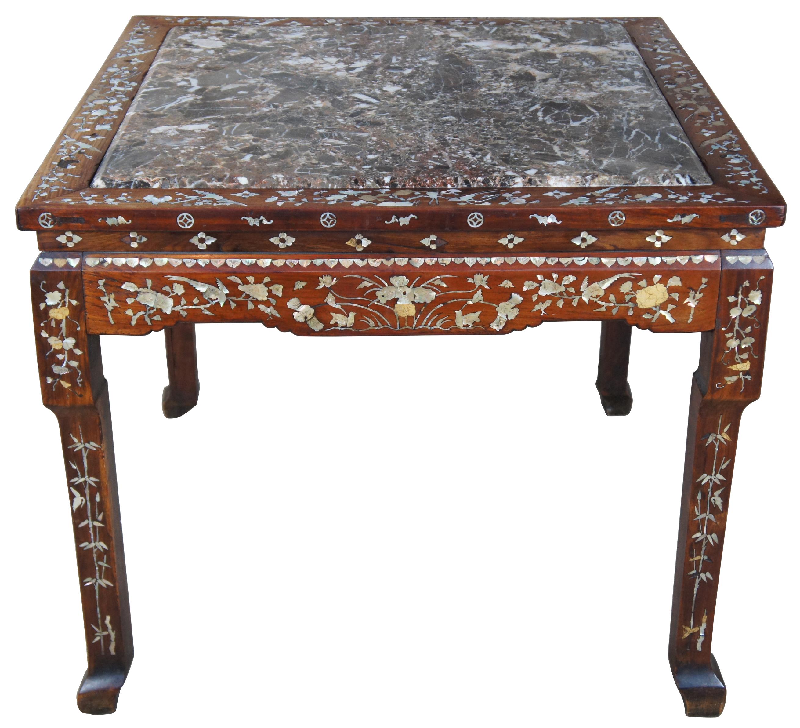 19th century Rosewood Mother of Pearl inlaid game or breakfast table with marble top insert. Intricately detailed with bamboo shoots along the legs, flowers and birds along the apron, and other decorative motifs.
      