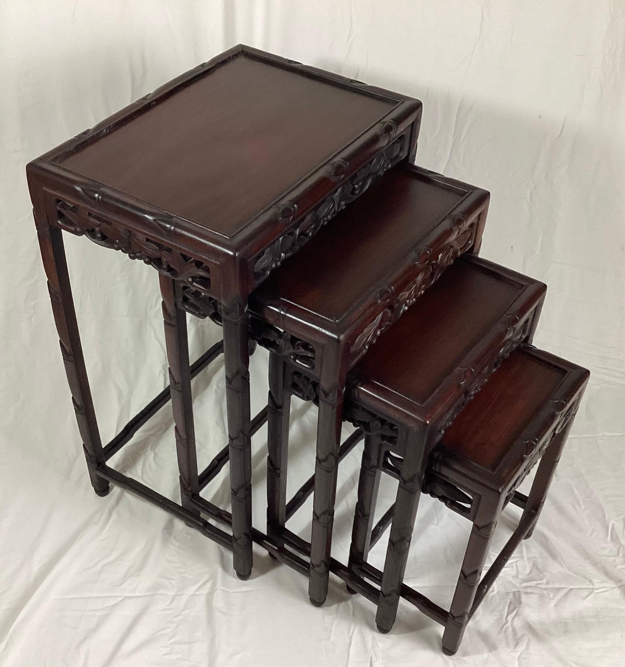 Hong Kong Chinese Rosewood Set of 4 Nesting Tables with Carved Frieze Decoration For Sale