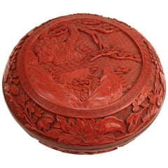 Chinese Round Cinnabar Box with Carved Scene of Five Scholars in a Garden