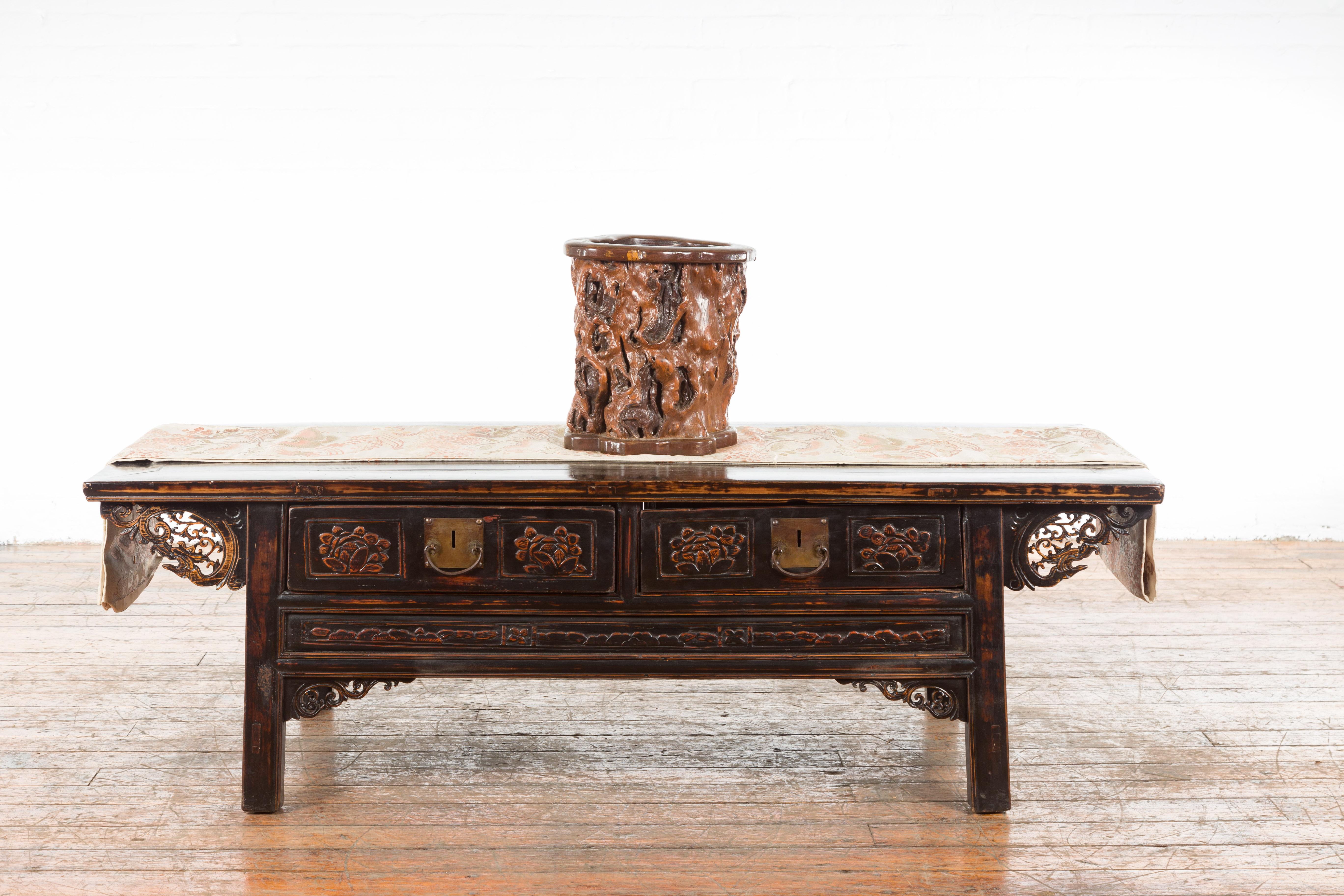 A Chinese vintage root planter from the mid 20th century, with dark brown patina. Created in China during the midcentury period, this root planter charms us with its rustic flair and dark patina. A great addition to any home, placed indoors or under