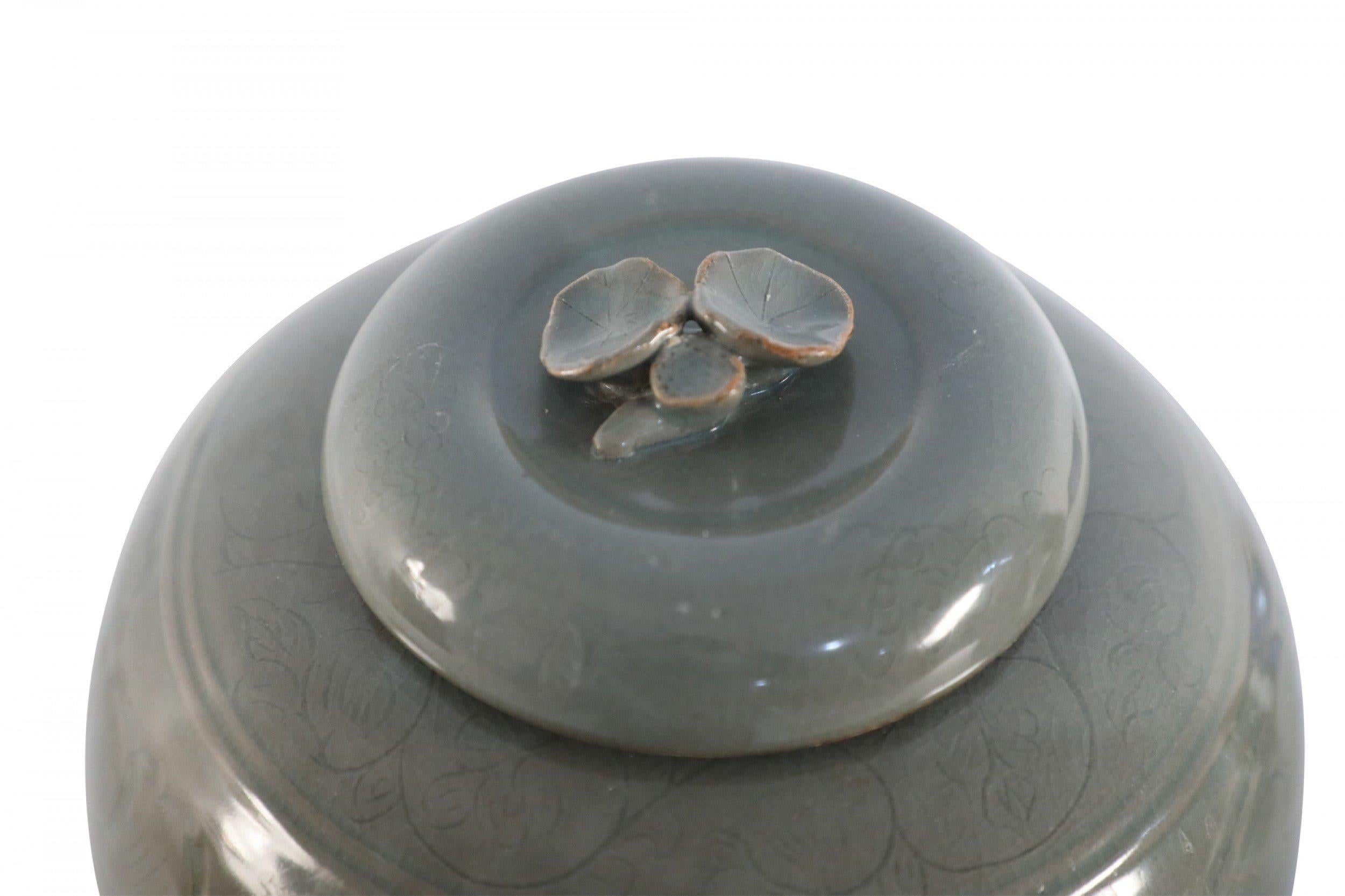 Chinese Sage and Tonal Botanical Motif Porcelain Jar 1
