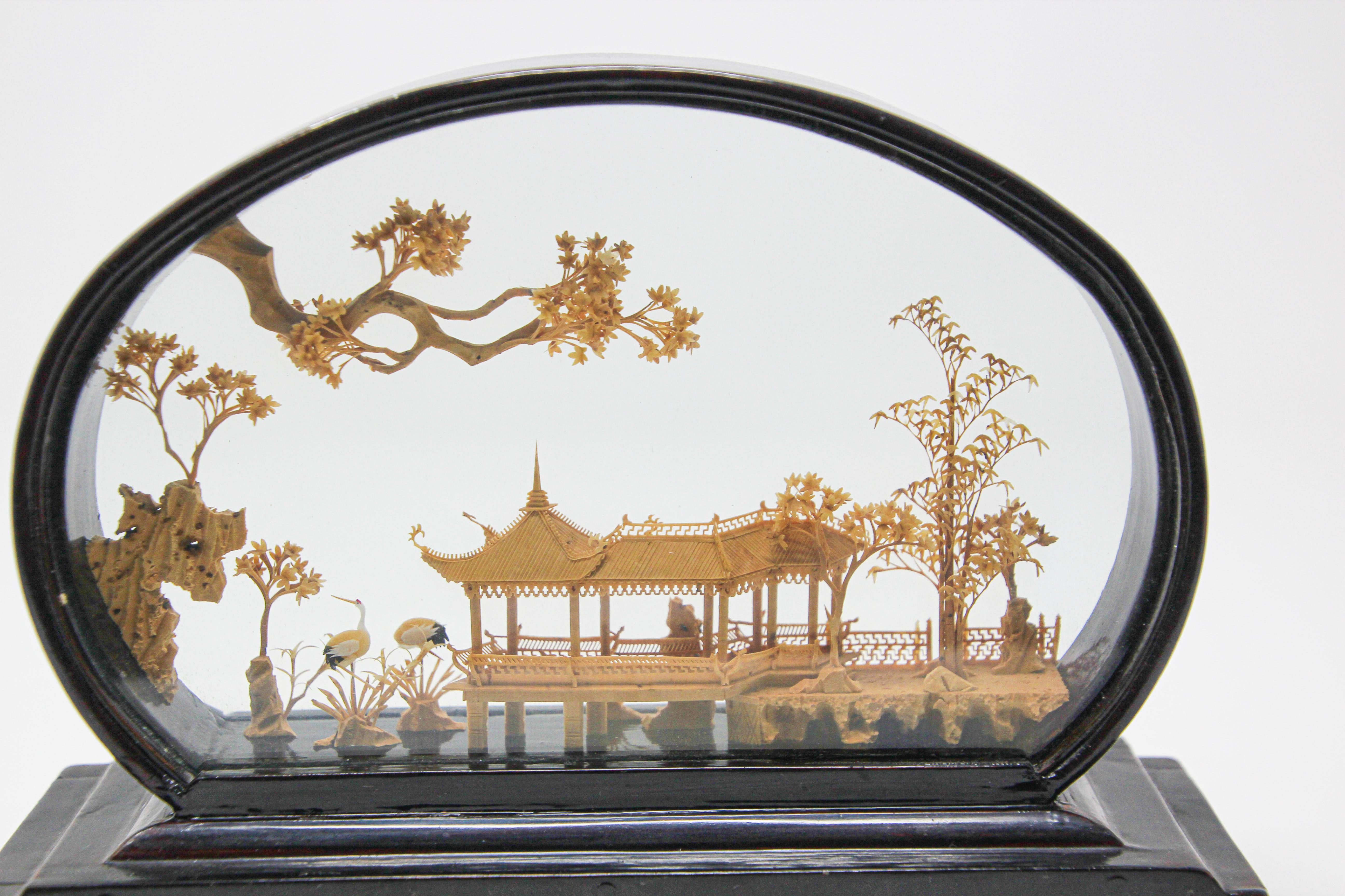 Vintage 1940s Chinese San You Diorama hand carved cork miniature architectural scene in glass case lacquered wood box.
San you are renowned for its carved cork dioramas.
Made in China, this gorgeous piece features a miniature architectural scene