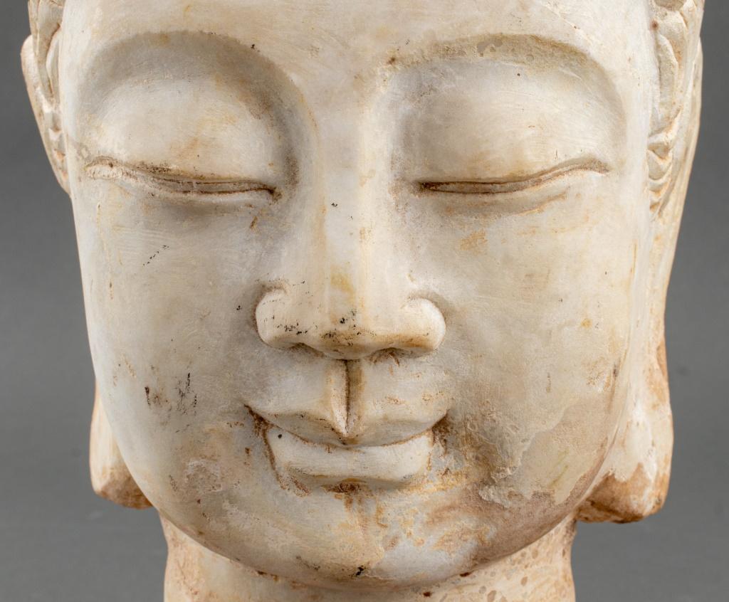 Chinese Sandstone Buddha Head Sculpture, mounted on a wood stand. Statue: 12.5
