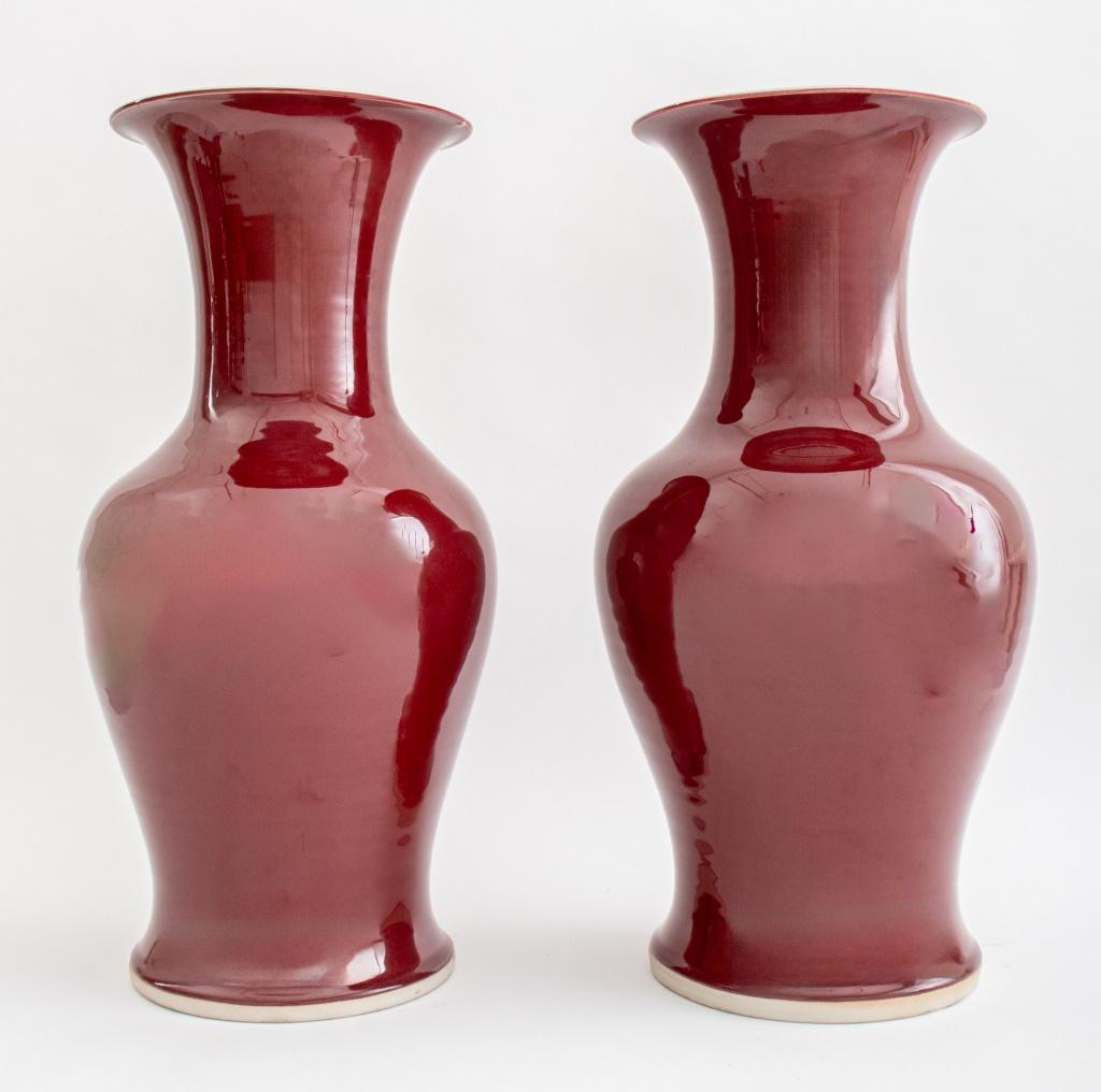 Pair of Chinese Sang de Boeuf Glazed Porcelain Baluster Form Vases.  22