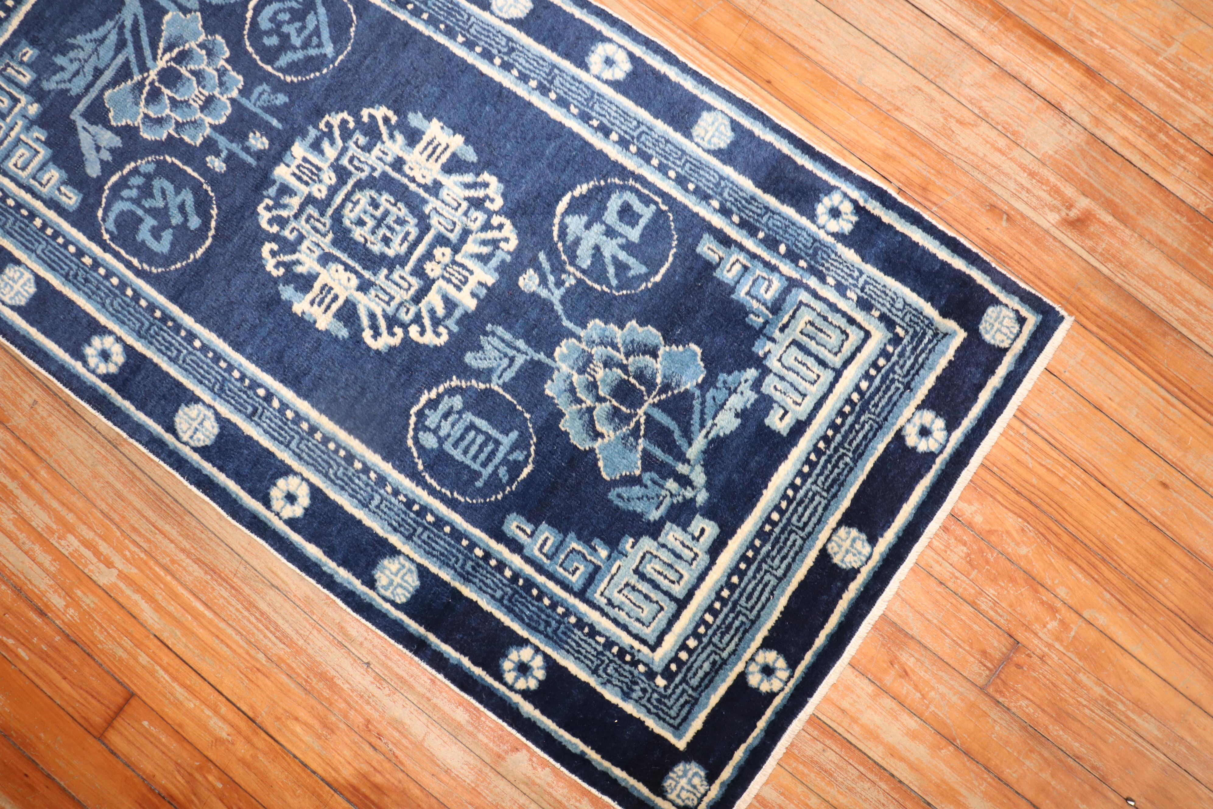 Scatter size Chinese peking rug in blue and white from the 2nd quarter of the 20th century.

Measures: 2'2
