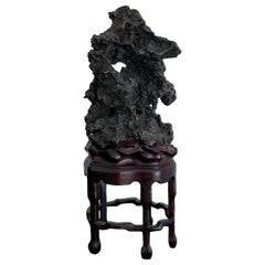 Chinese Scholar Rock in Metal Form on Display Stand