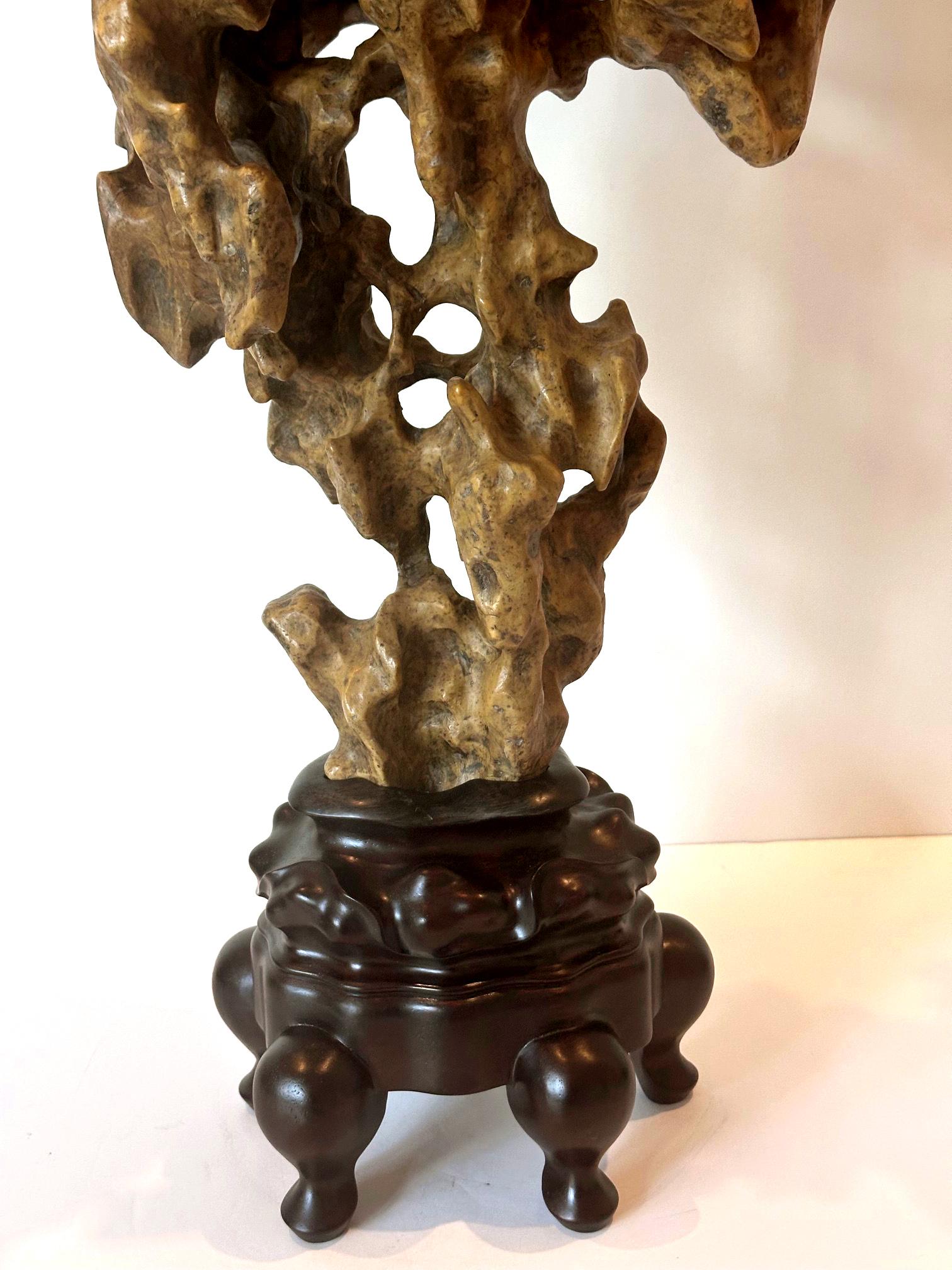 Limestone Chinese Scholar Rock Yellow Taihu Stone on Wood Stand For Sale