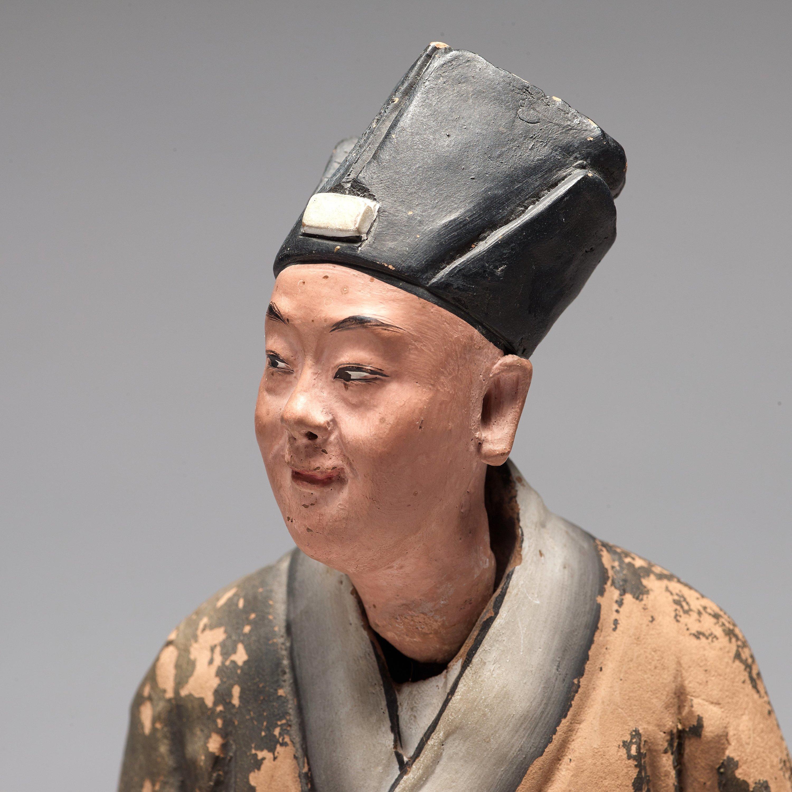 Chinoiserie Chinese Sculptured and Painted Clay Figure of a Man Holding a Lingzhi Mushroom