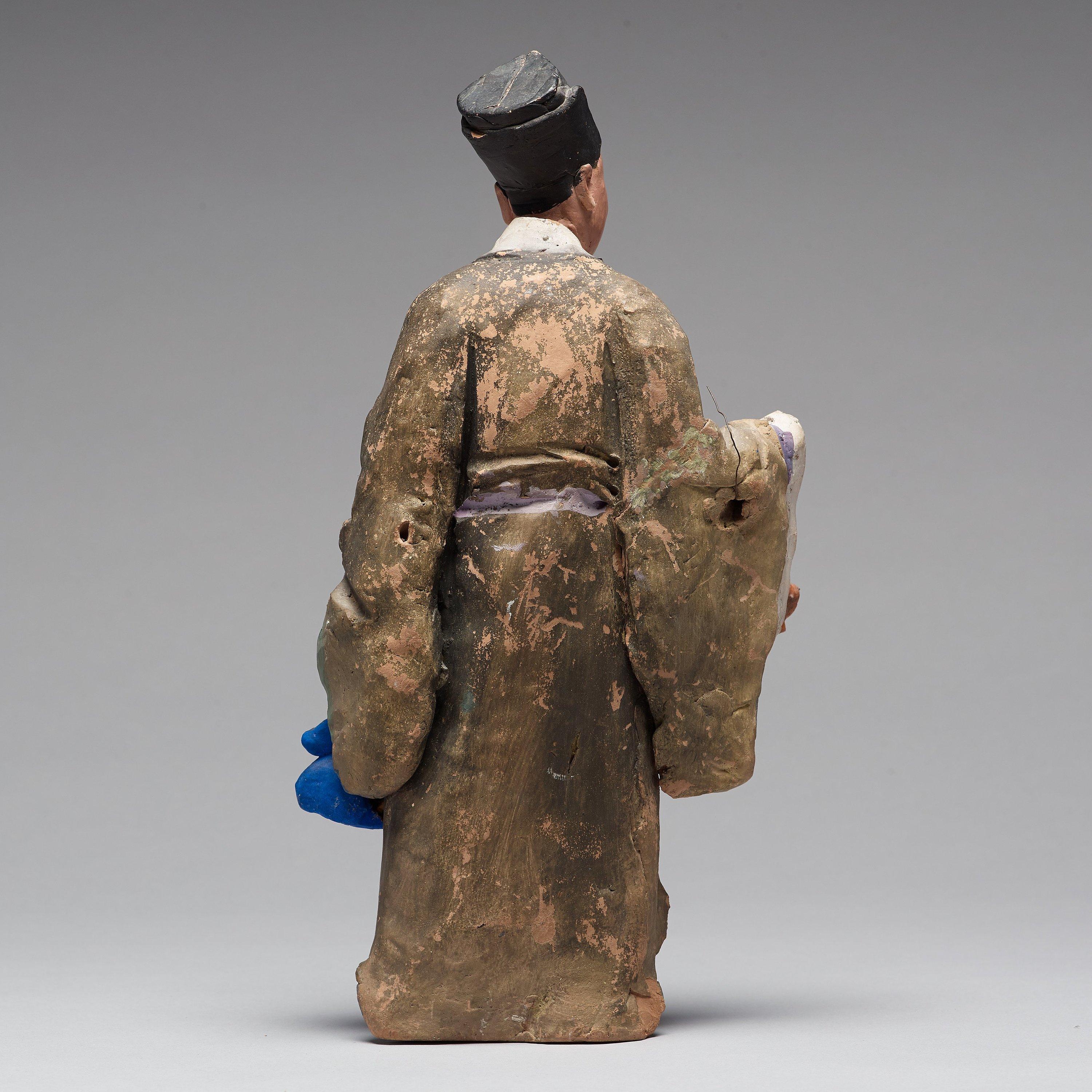 Chinese Sculptured and Painted Clay Figure of a Man Holding a Lingzhi Mushroom In Fair Condition In Stockholm, SE