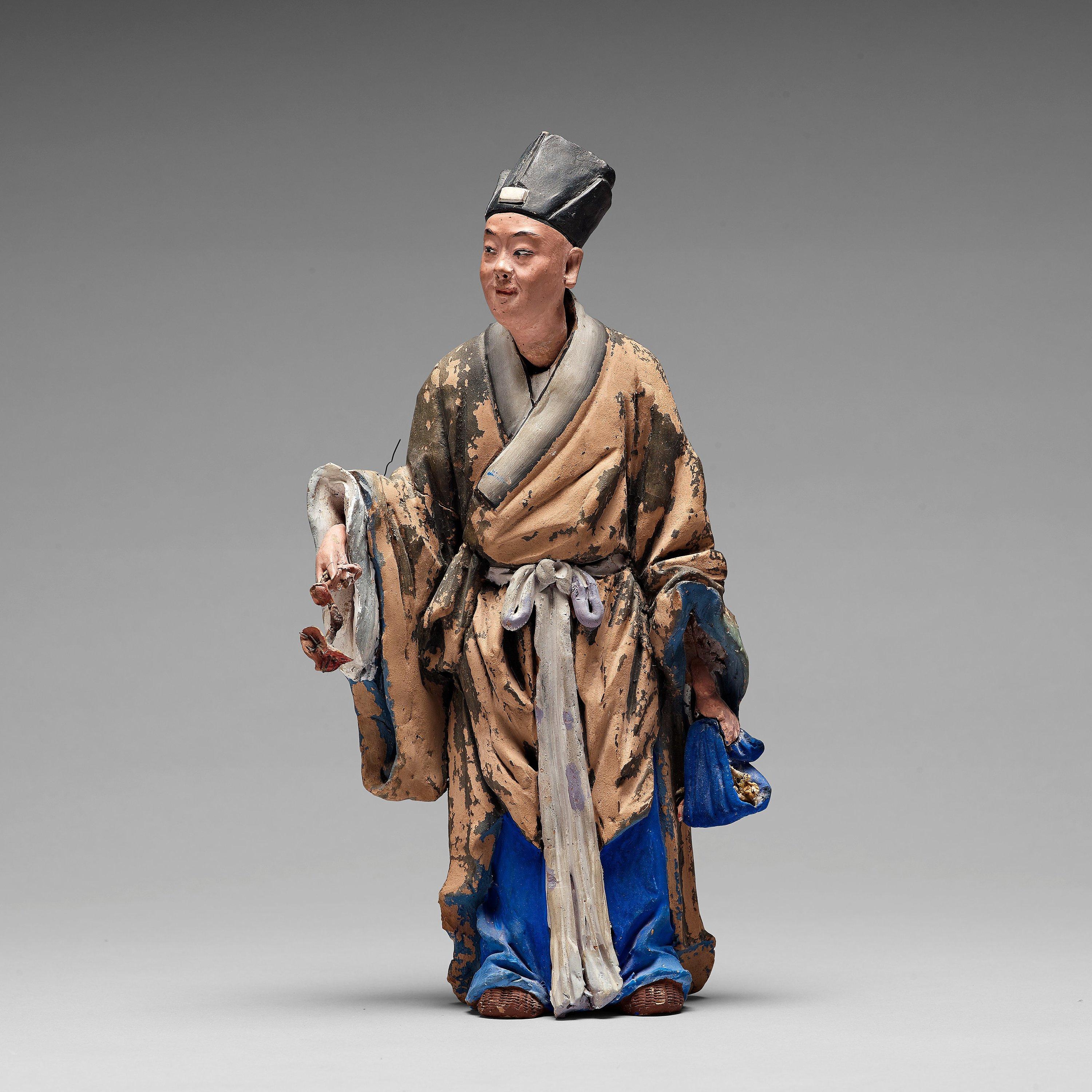 Chinese Sculptured and Painted Clay Figure of a Man Holding a Lingzhi Mushroom 1